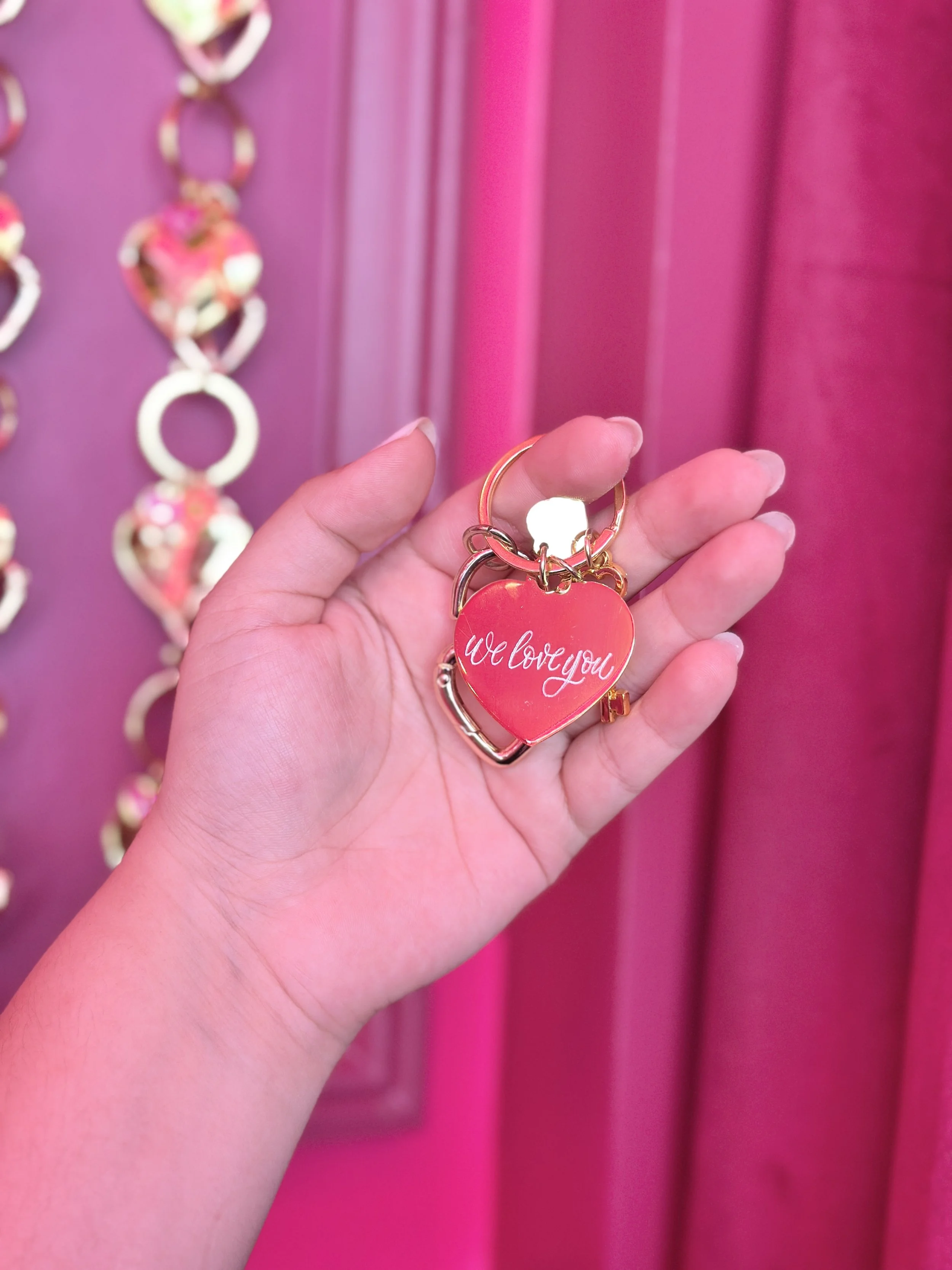 live calligraphy engraving on heart-shaped metal keychains4890.jpeg