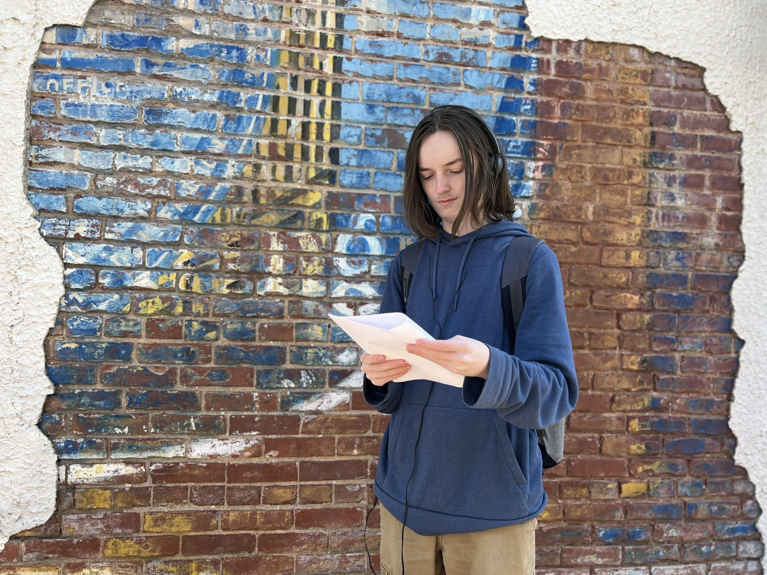   Greg studies his lines one last time before �action�.  