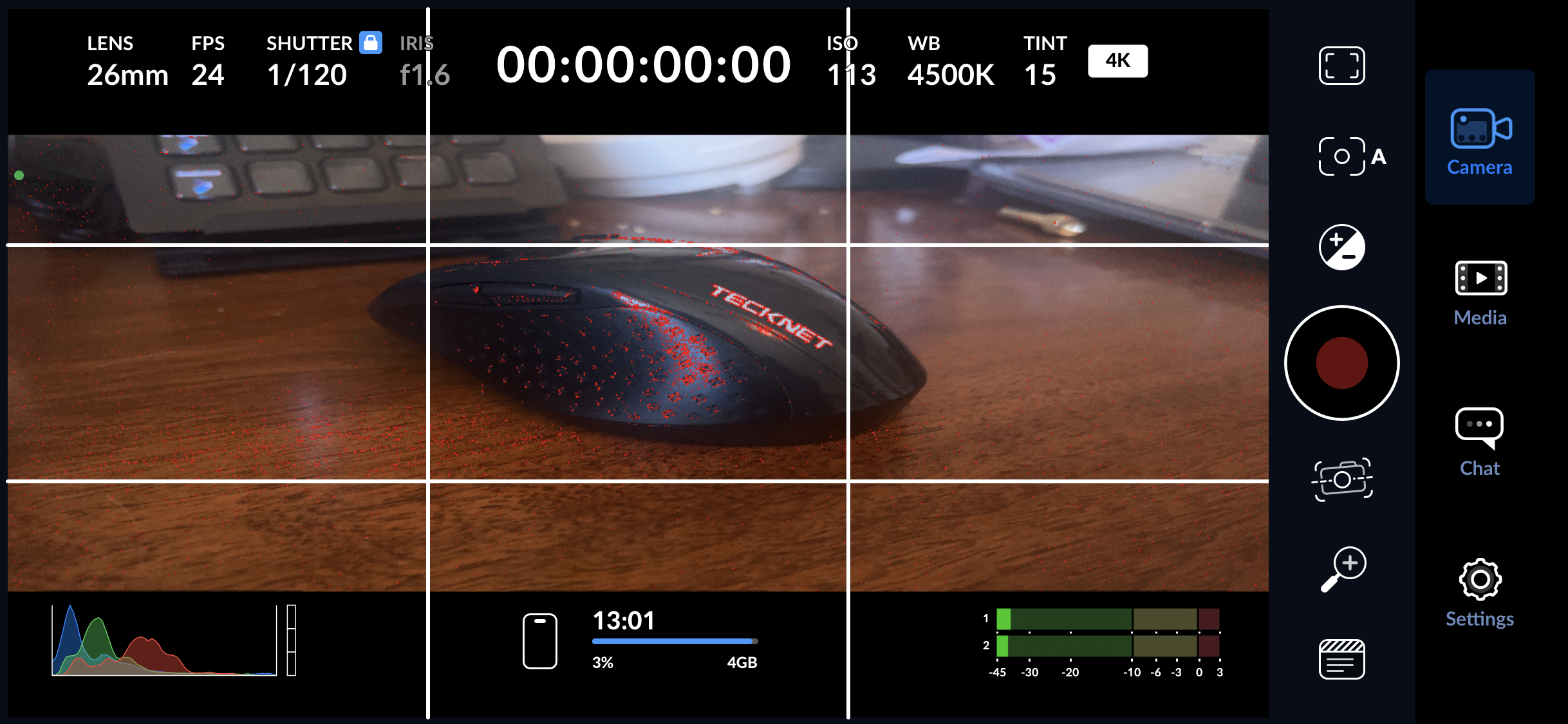  Screen capture of the BMD Camera app showing focus assist (red) and the rule of thirds overlay.  