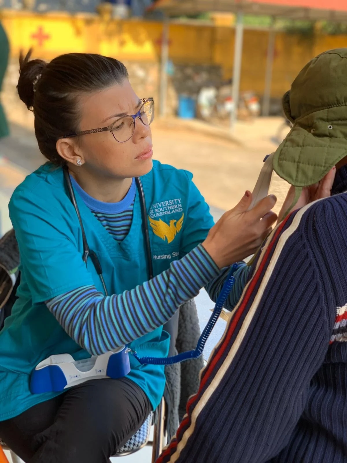 nursing student conducting health assessment on patient.jpg