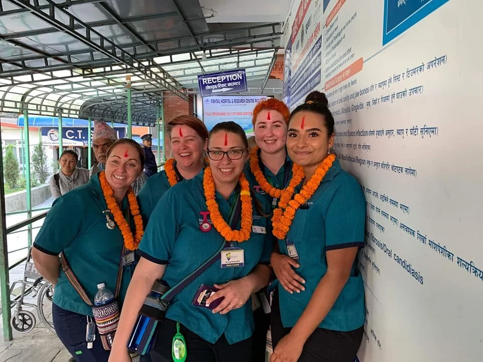nursing group receive traditional blessing in nepal.jpg