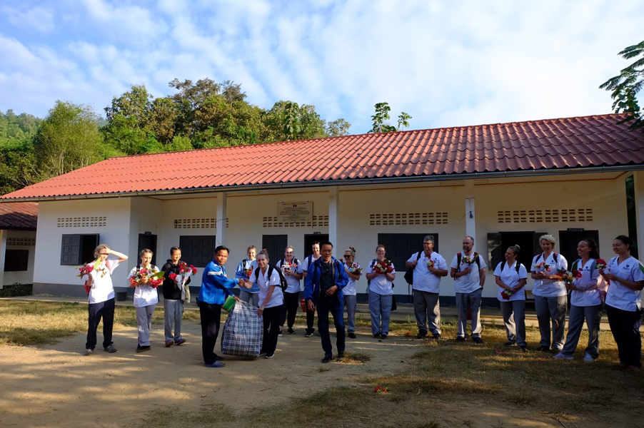group give fundraised donations to village in vietnam.png