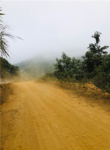 long dusty road to travel to remote villages while on placement in laos.png