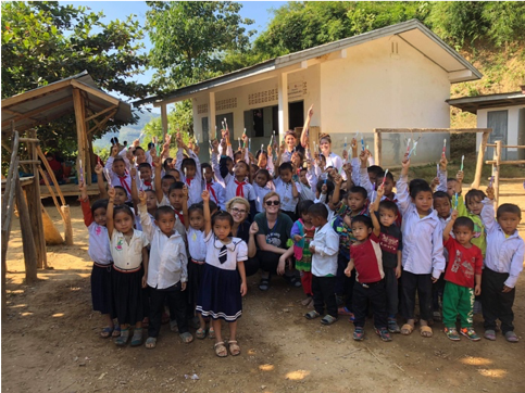 nursing students run oral hygiene sessions with village children while on clinical placement.png