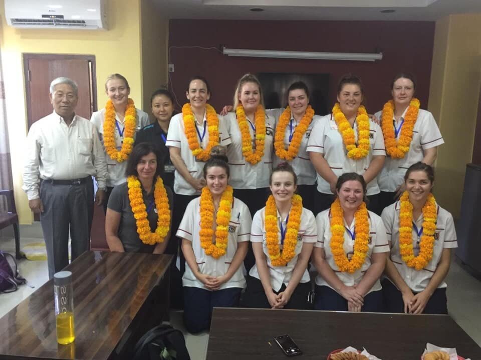 nursing group and sonam are welcomed with blessing in nepal.jpg