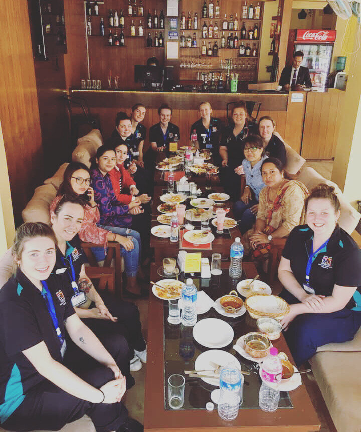 nursing group enjoys meal together in nepal while on placement.jpeg