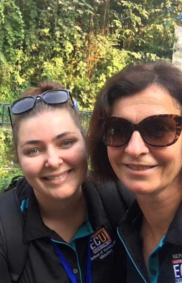 student nurse and academic supervisor while on clinical placement in nepal.jpg