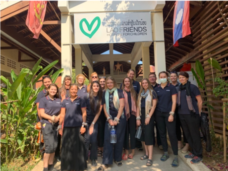group photo outside laos hospital for children in luang prabang.png