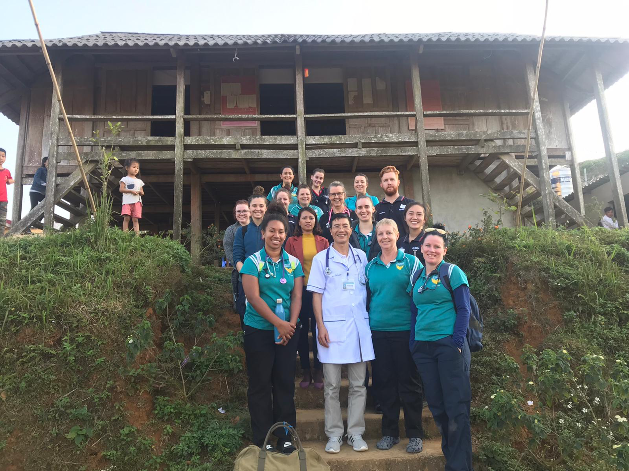nursing group and local health workers while on placement in vietnam.png