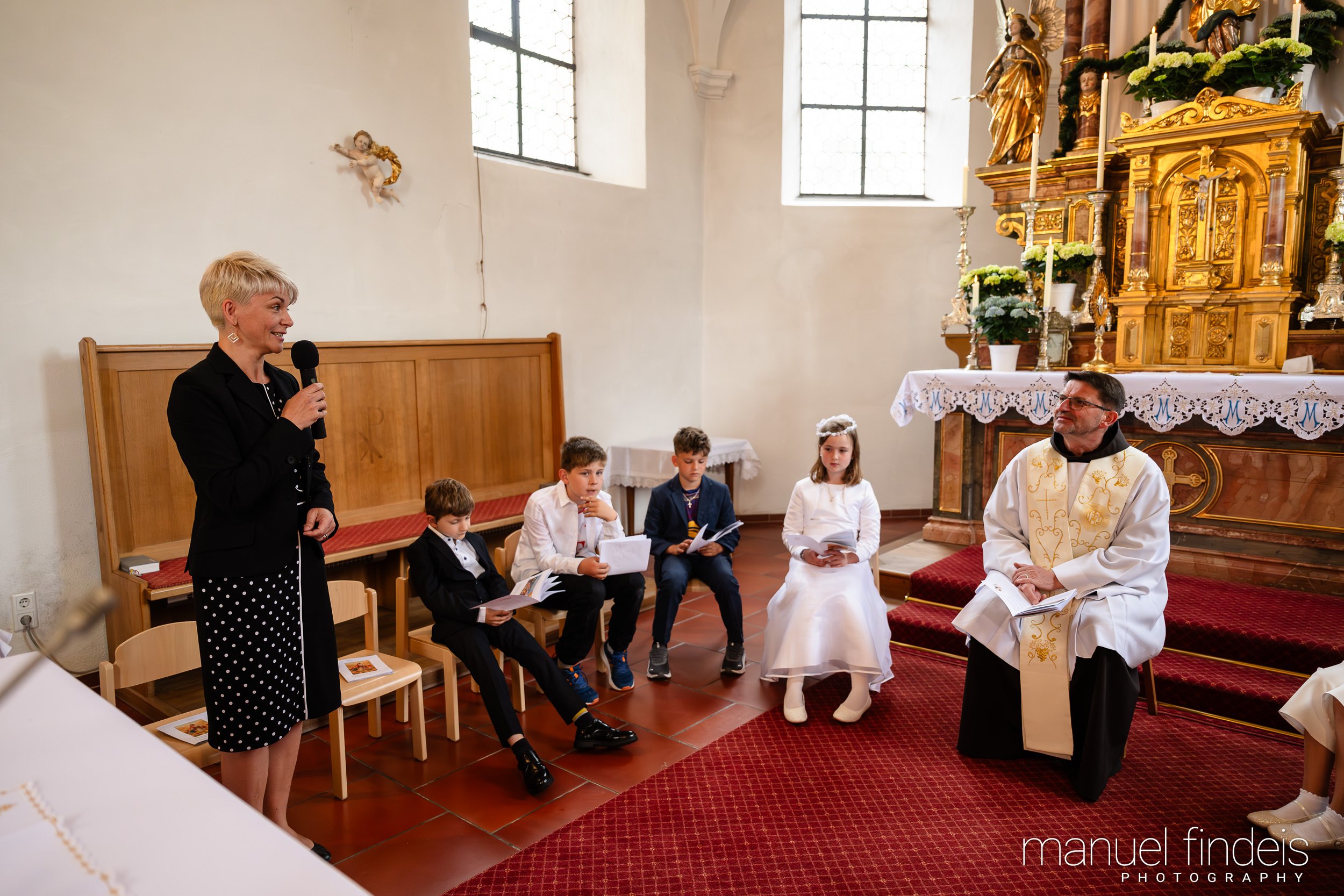 0671_Erstkommunion_2026_www.manuelfindeis.com.jpg