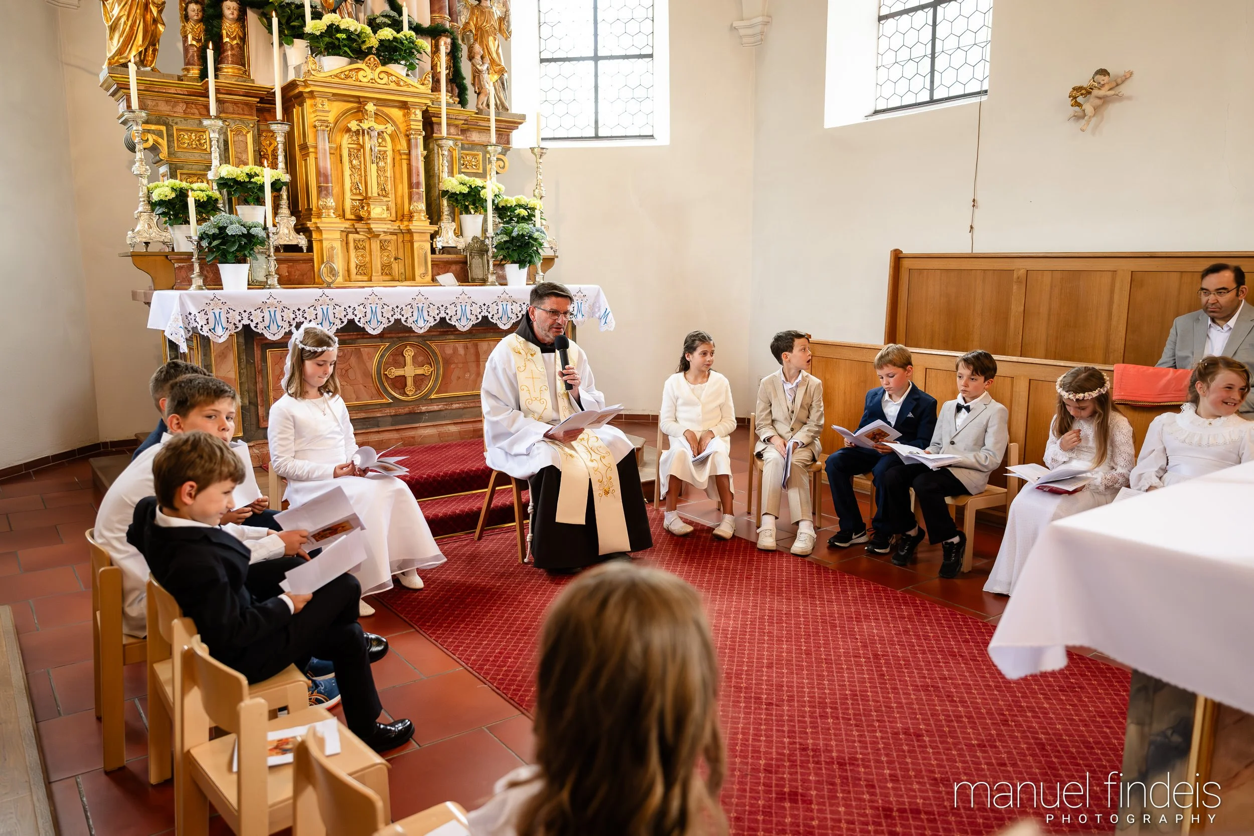 0599_Erstkommunion_2026_www.manuelfindeis.com.jpg