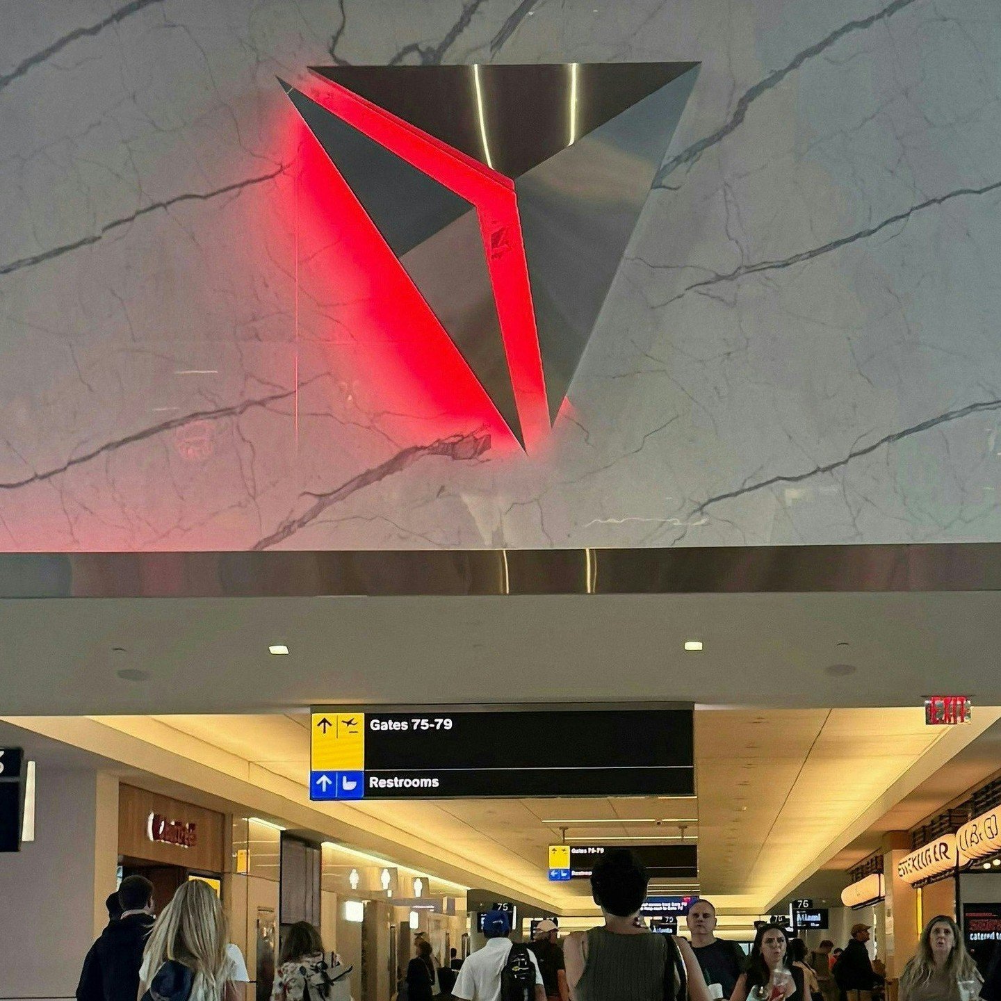 There's nothing like seeing signs that represent relaxation &amp; home after an 8-hour long teaching day. The delta sign signals lounge and ease, and Mayor Dickens faces signals the final leg of the journey.  Even after seeing Andre's face there's st