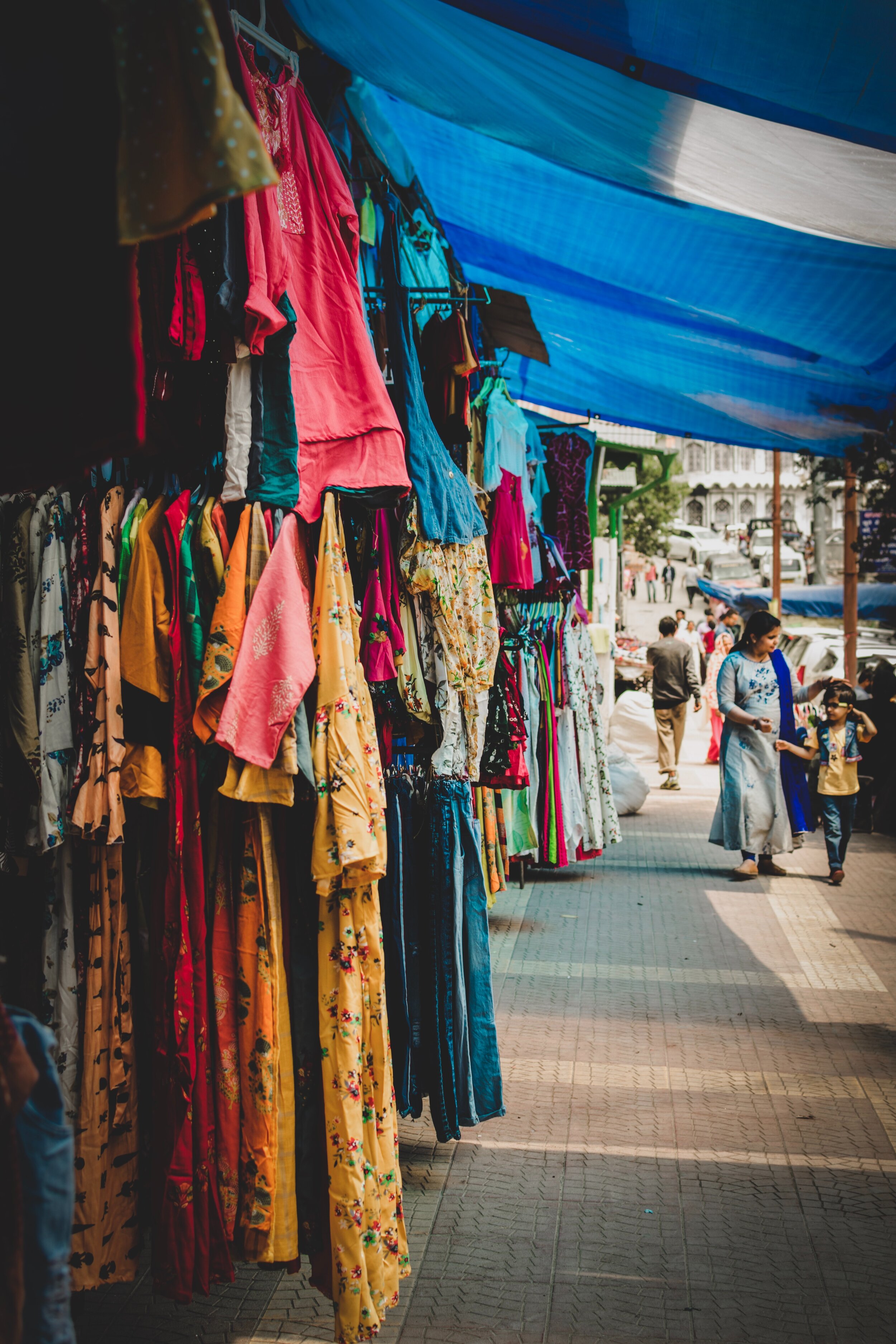 stores-on-sidewalk-selling-clothes-2460457.jpg