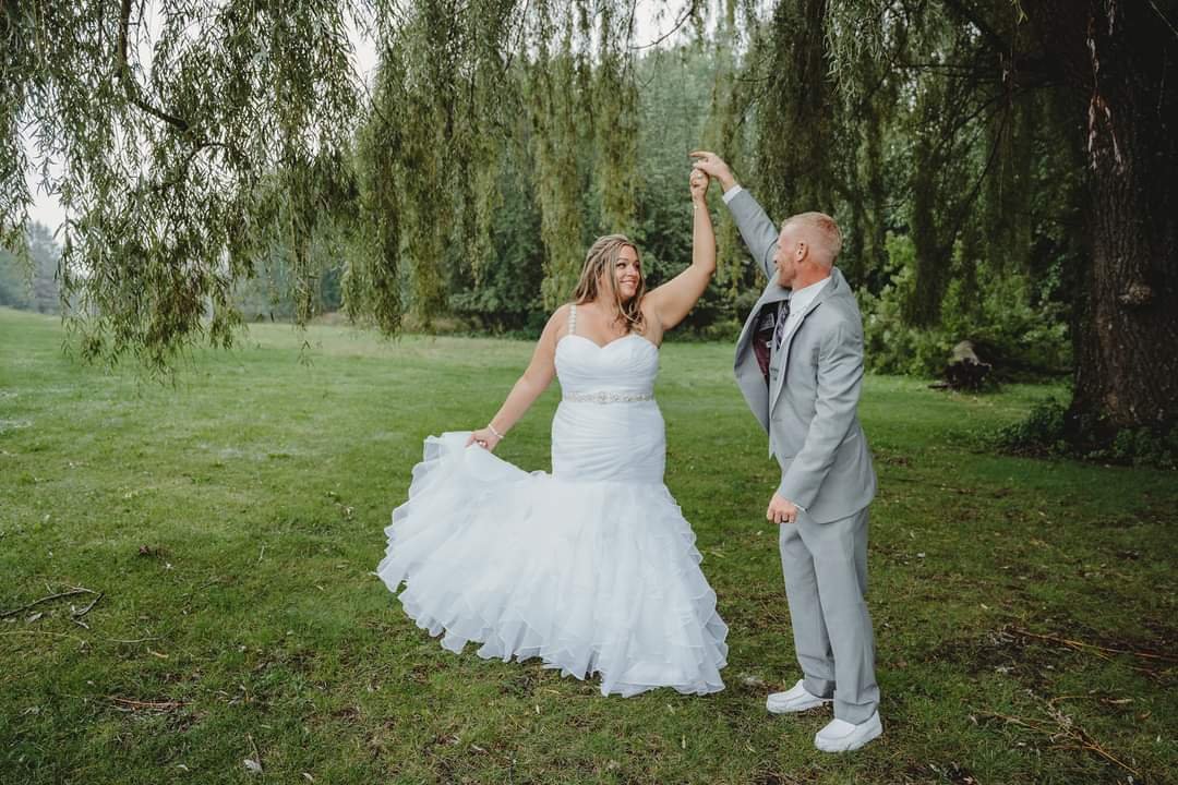 Wedding Photo - holding hands high.jpg