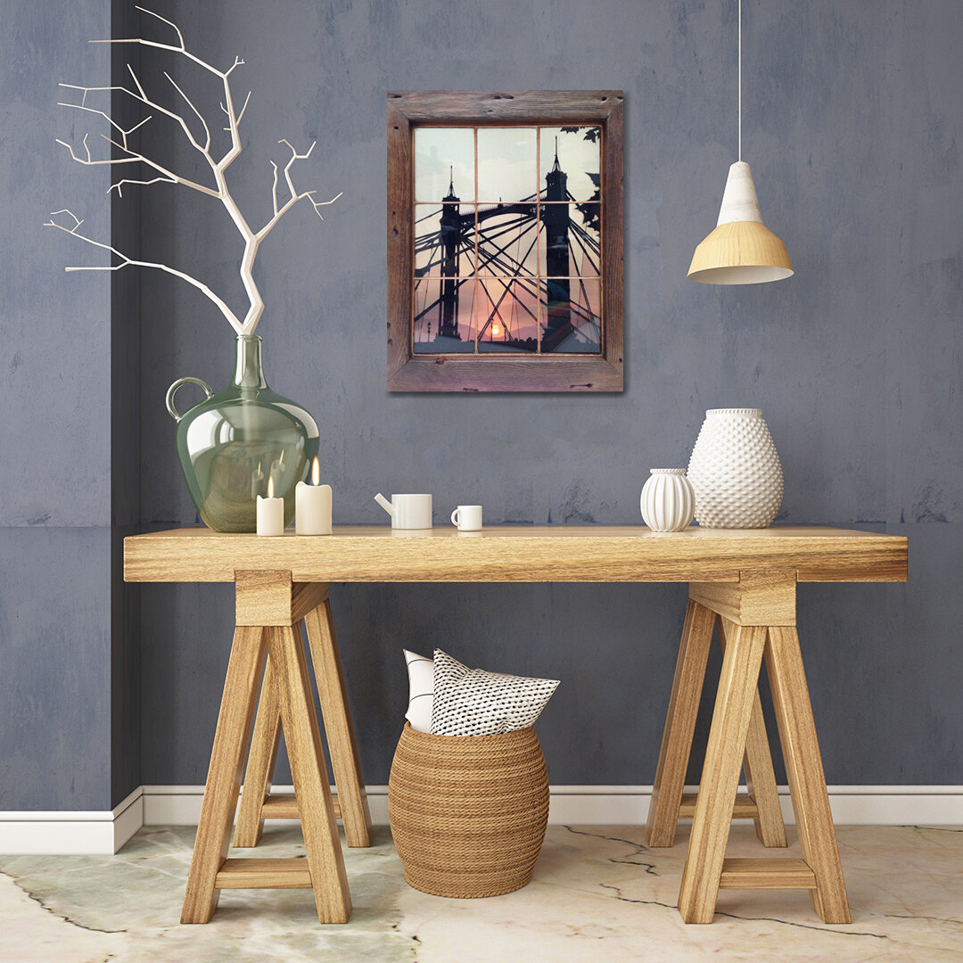 albert bridge sunset window desk AdobeStock_218950214.jpg