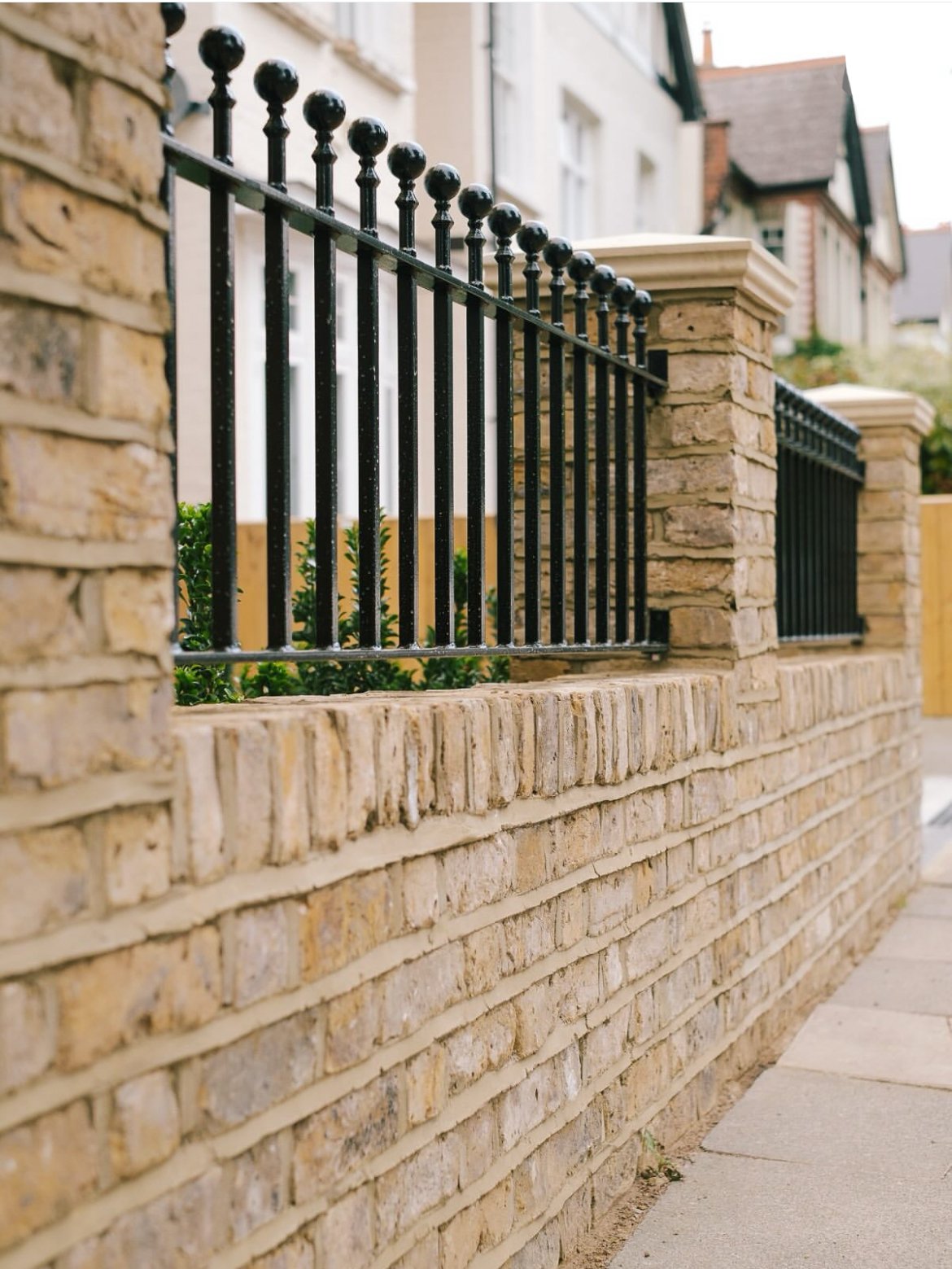 New brick wall and railings