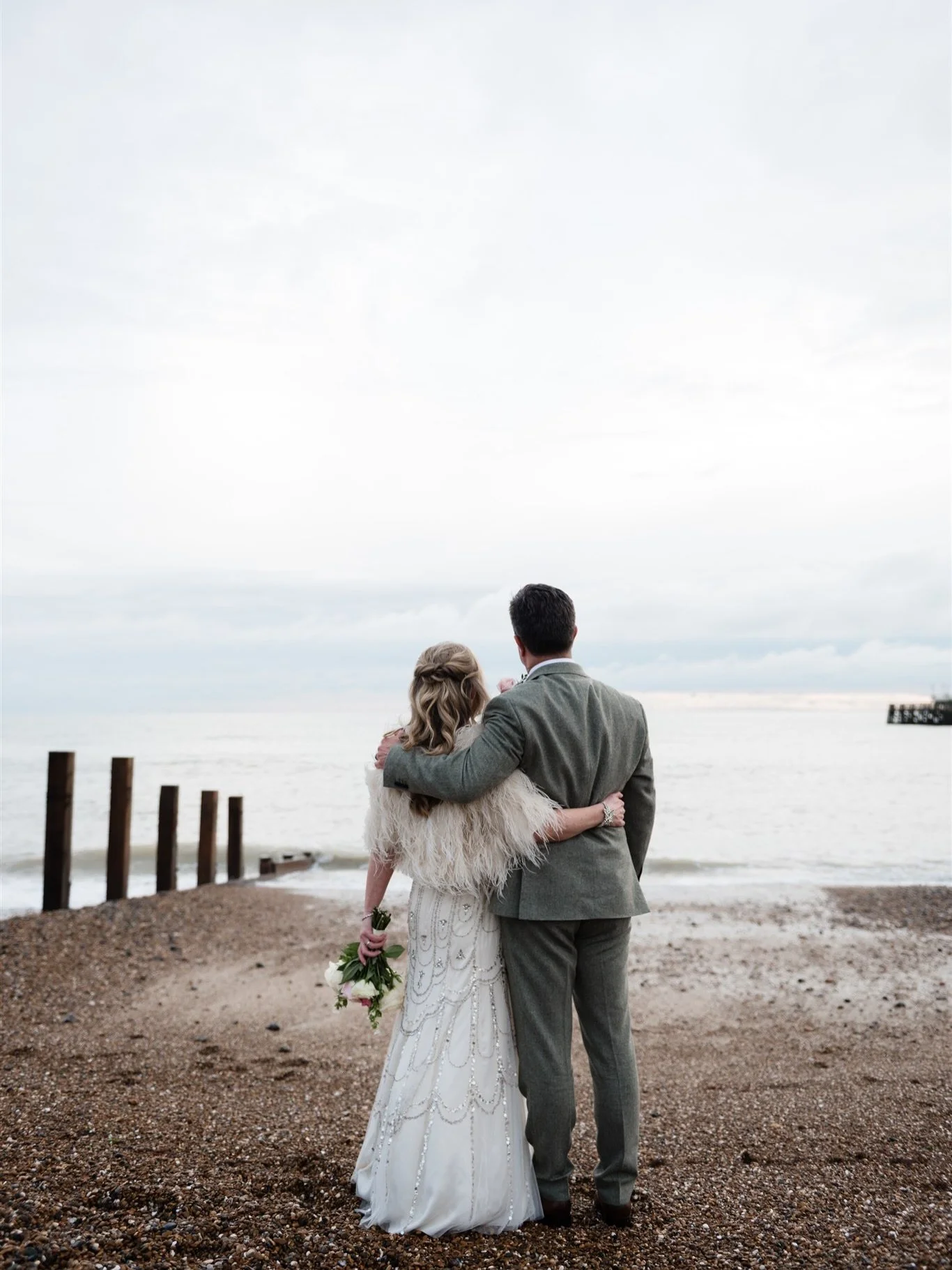 A coastal winter wedding at an iconic seaside venue.

I photographed my dear friend&rsquo;s wedding yesterday, just after the solstice. A cold but bright day by the sea, with clear winter light and a sunset that cast pink skies behind the pier.

Anna