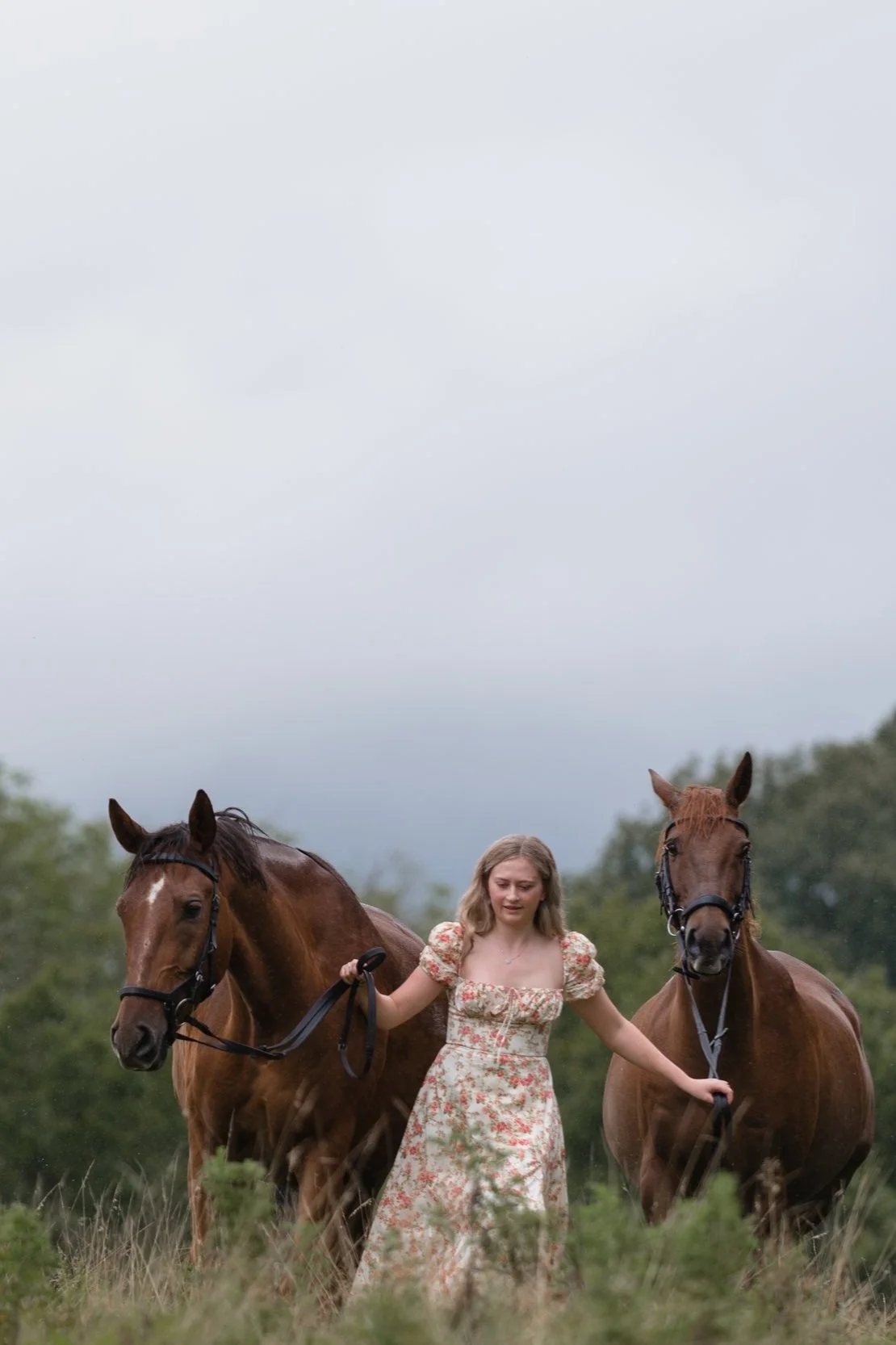 horses girl in dress in rain
