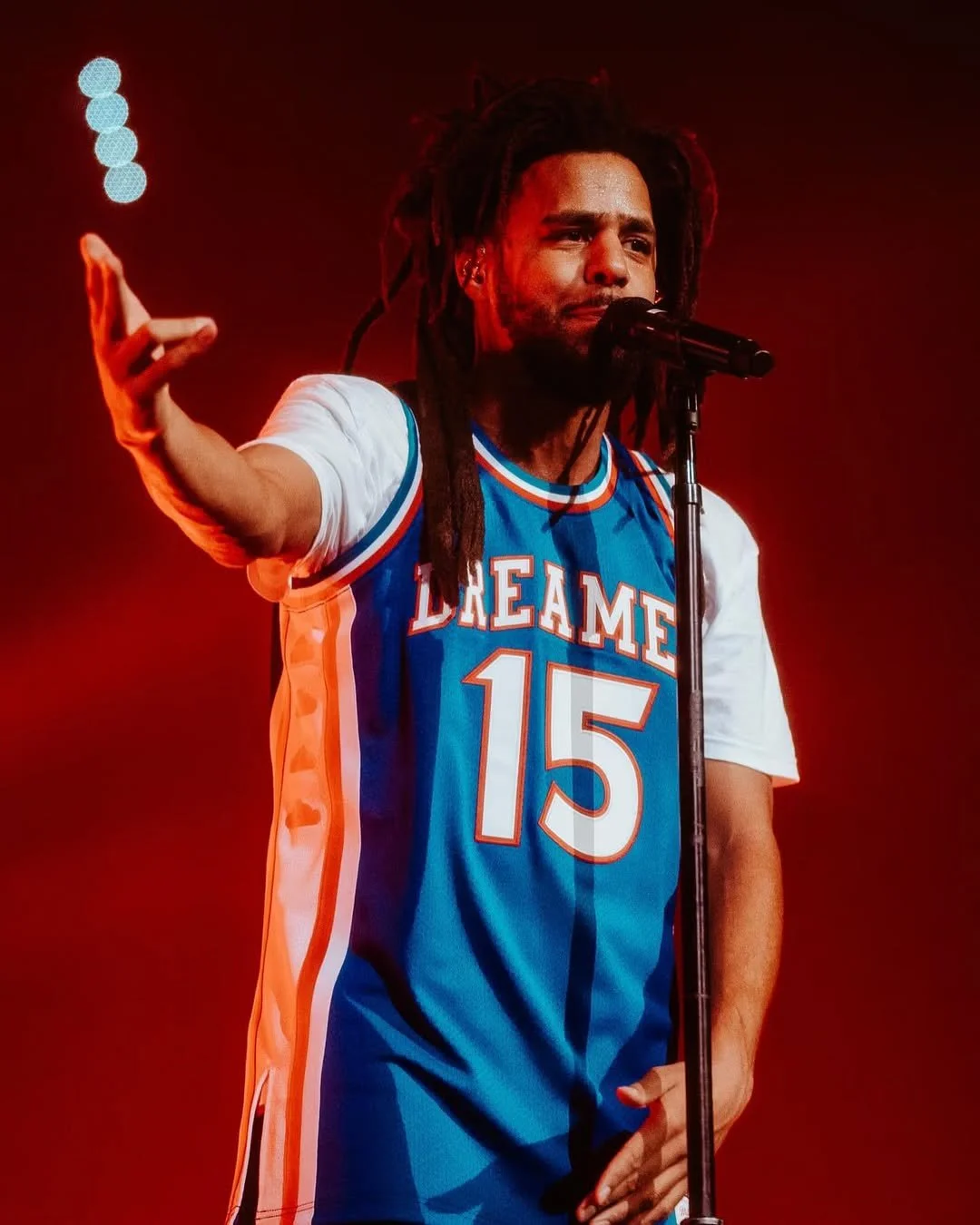 throwback to when J. Cole wore Dreamville x Mitchell & Ness jerseys to every city he performed i-10.jpg