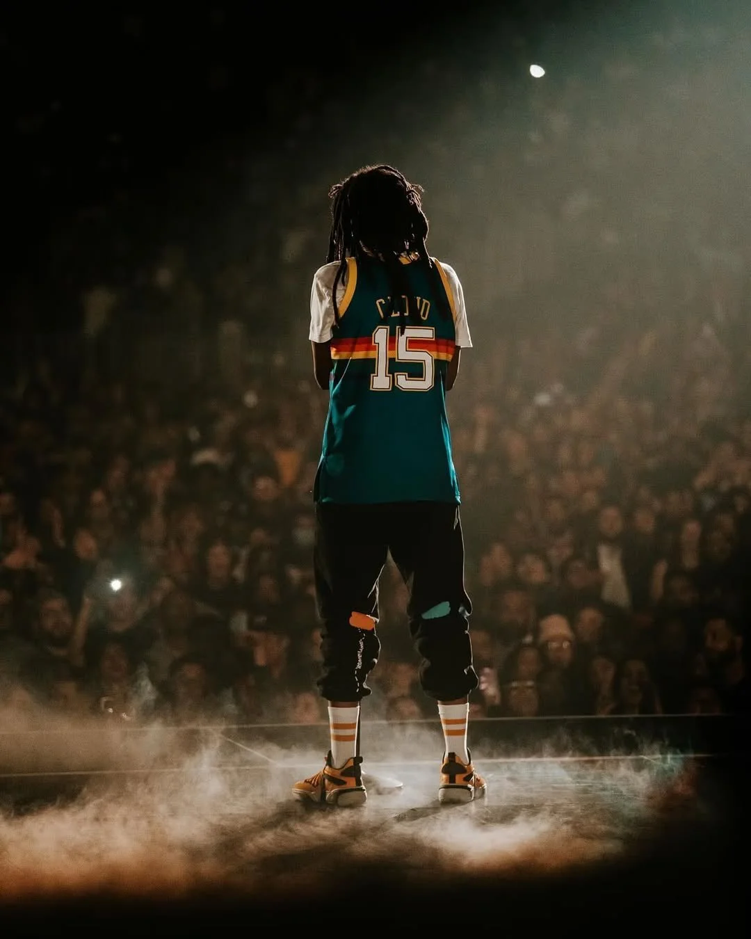 throwback to when J. Cole wore Dreamville x Mitchell & Ness jerseys to every city he performed i-6.jpg