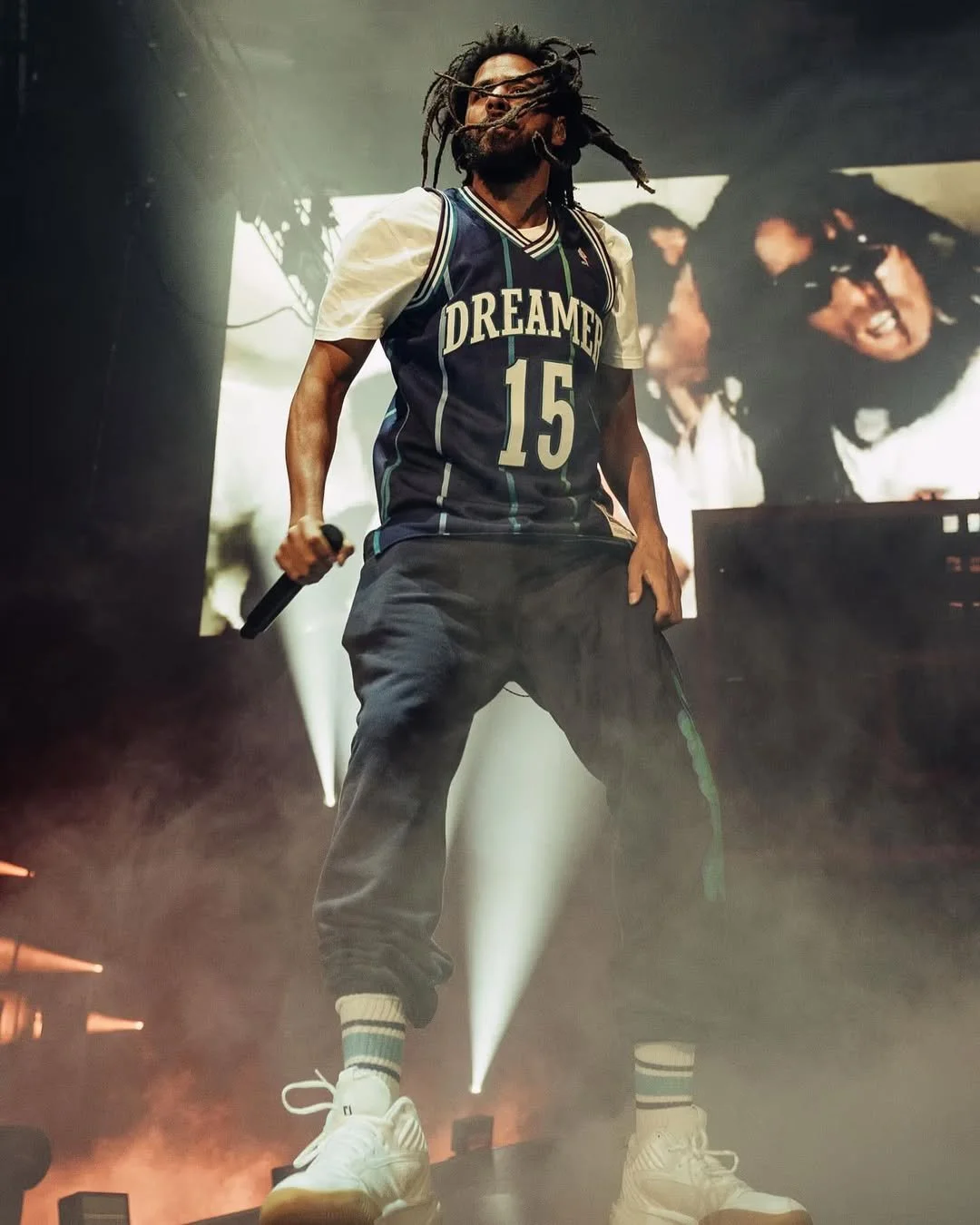 throwback to when J. Cole wore Dreamville x Mitchell & Ness jerseys to every city he performed i-5.jpg