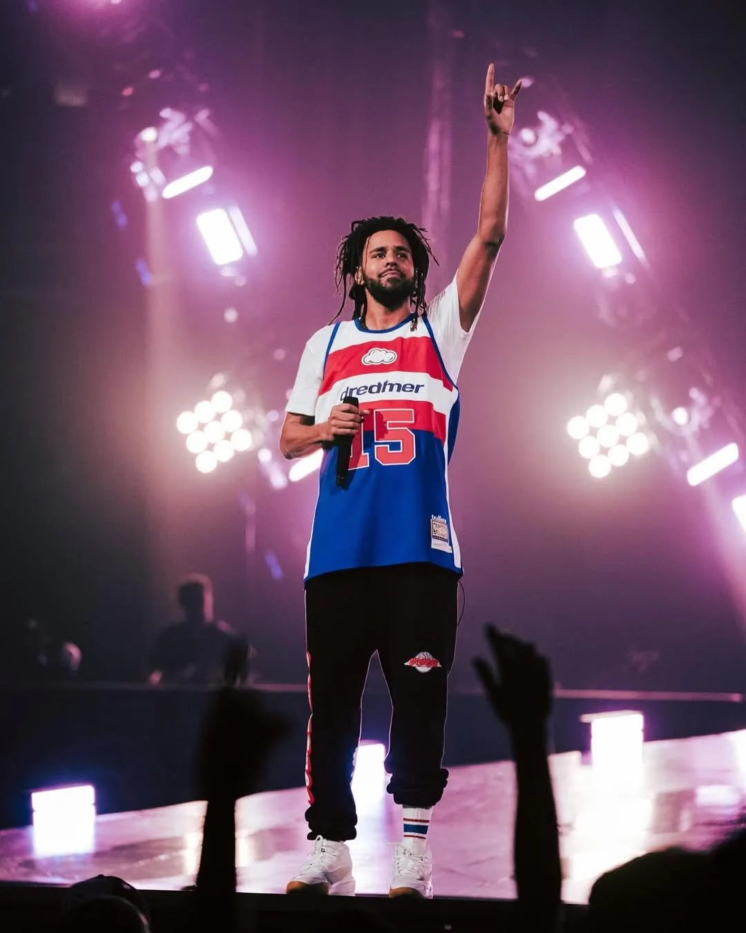 throwback to when J. Cole wore Dreamville x Mitchell & Ness jerseys to every city he performed i-4.jpg