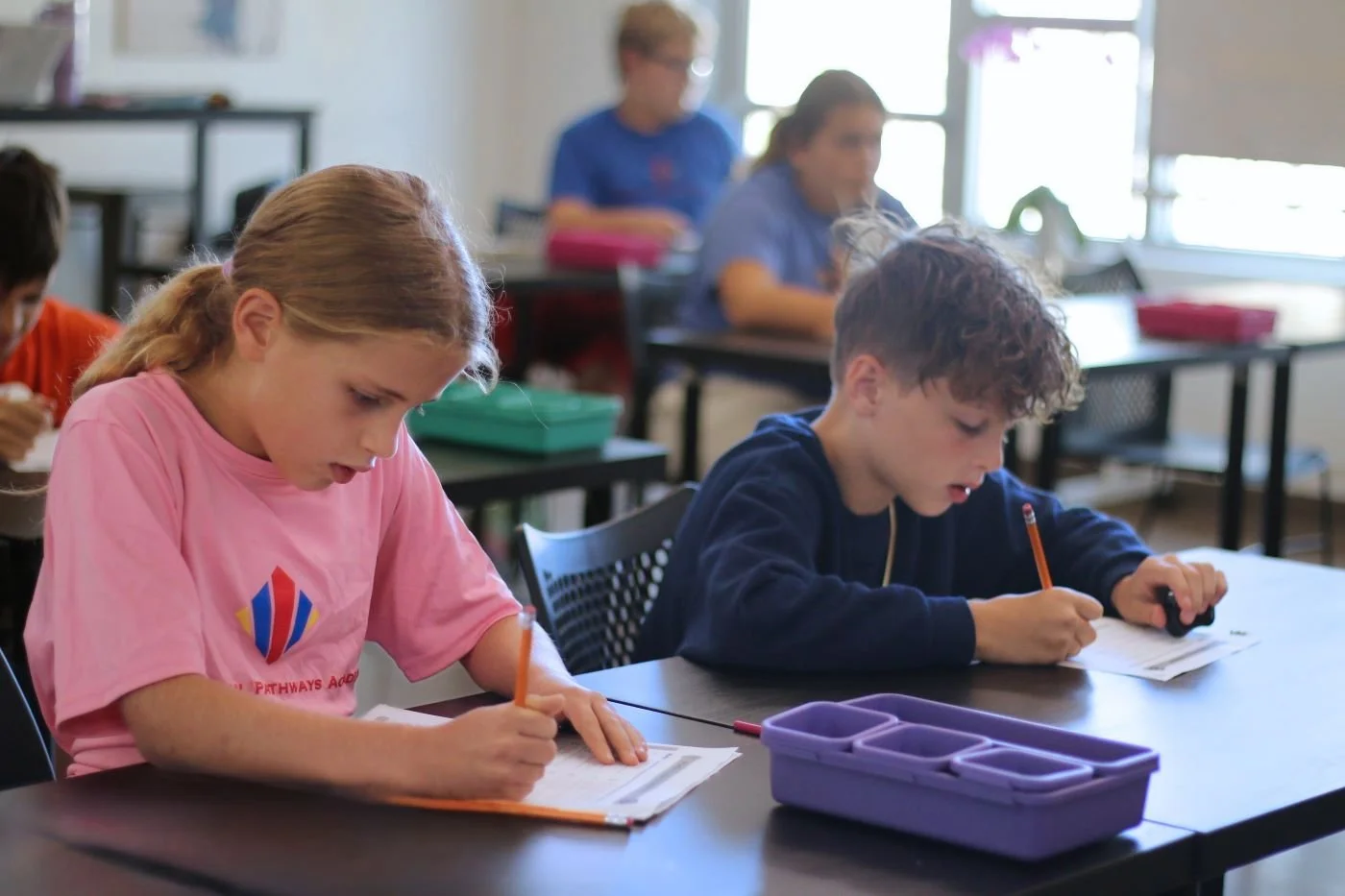 Students with learning differences enjoys syllabication lesson in Orton-Gillingham class at Educational Pathways Academy, a private school for dyslexia and learning disabilities in Florida.jpg