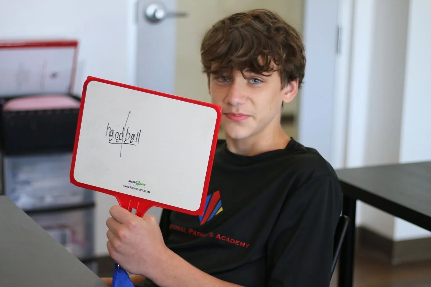 Student thrives in syllabication lesson in Orton-Gillingham class at Educational Pathways Academy, a private school for dyslexia and learning disabilities in Florida.jpg