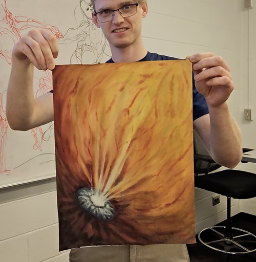 A calm group workshop with participants focused on their creations