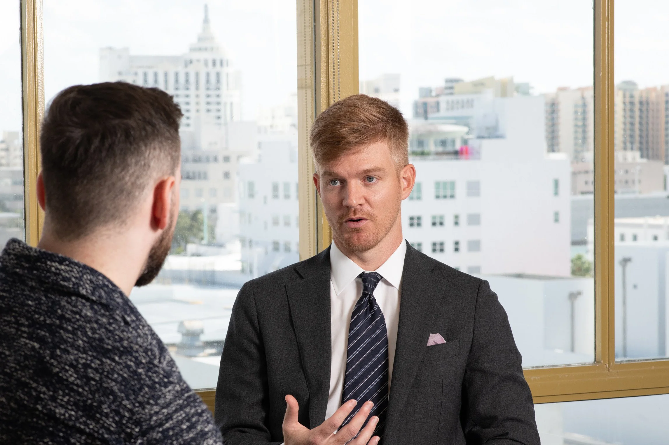 Attorney Ron Hink consulting with a client.