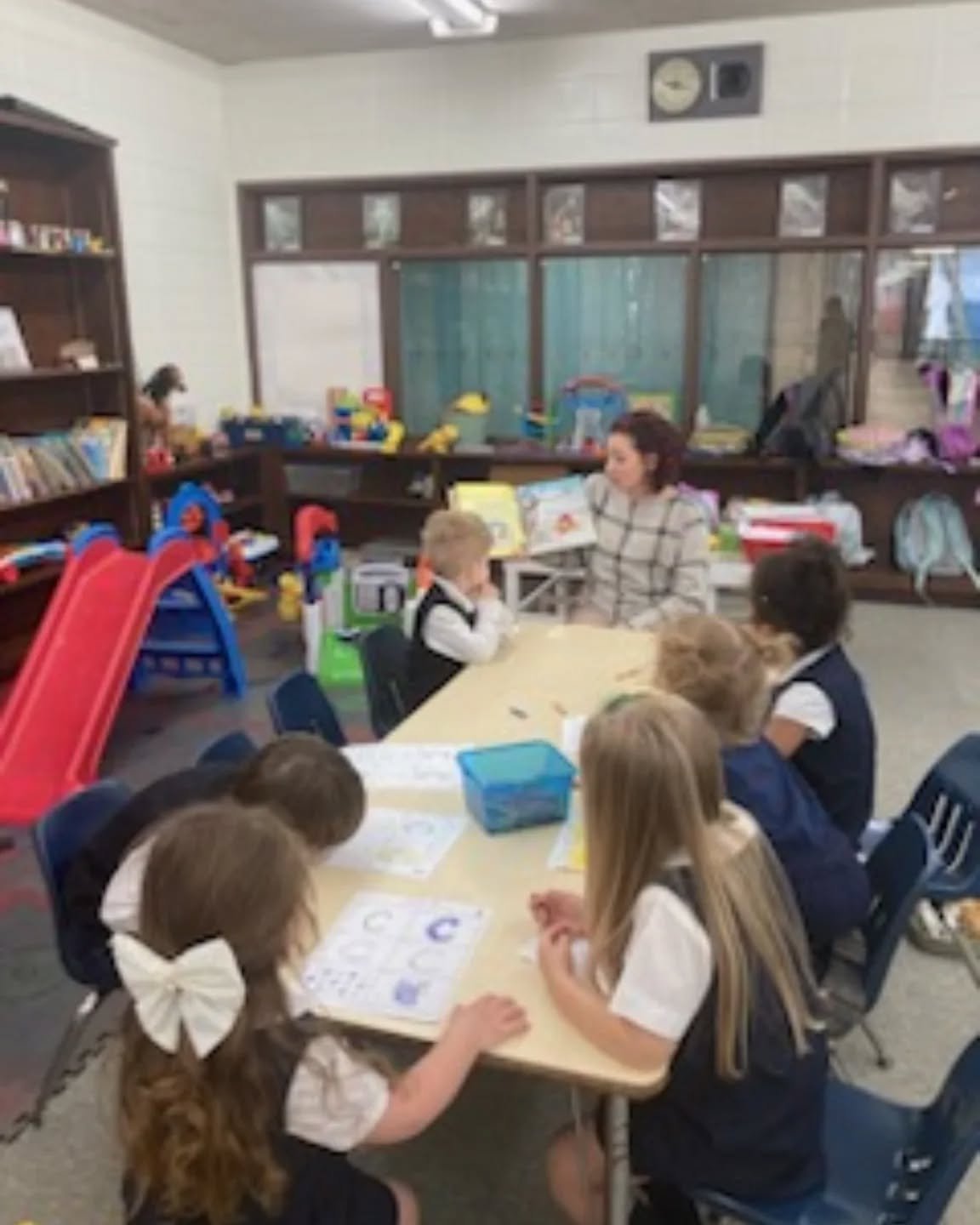 The Prek class enjoyed having guest reader, Angelina (QOTA Alum), during a surprise visit.

#Catholic,  #classical,  #education, ##qotaproud