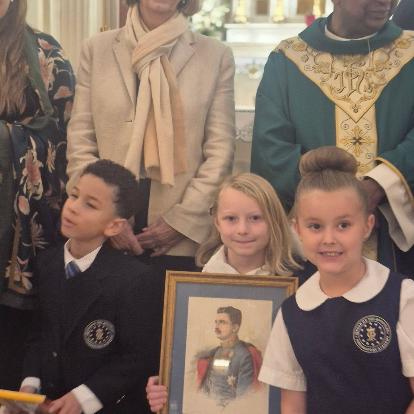 Thank you to all for a wonderful event.
Let us pray for one another as we lift each other up to Heaven. Blessed Karl, pray for us.

Princess Marianna, Father James, and QOTA students holding second class relics of Blessed Karl of Austria. Tours, talk