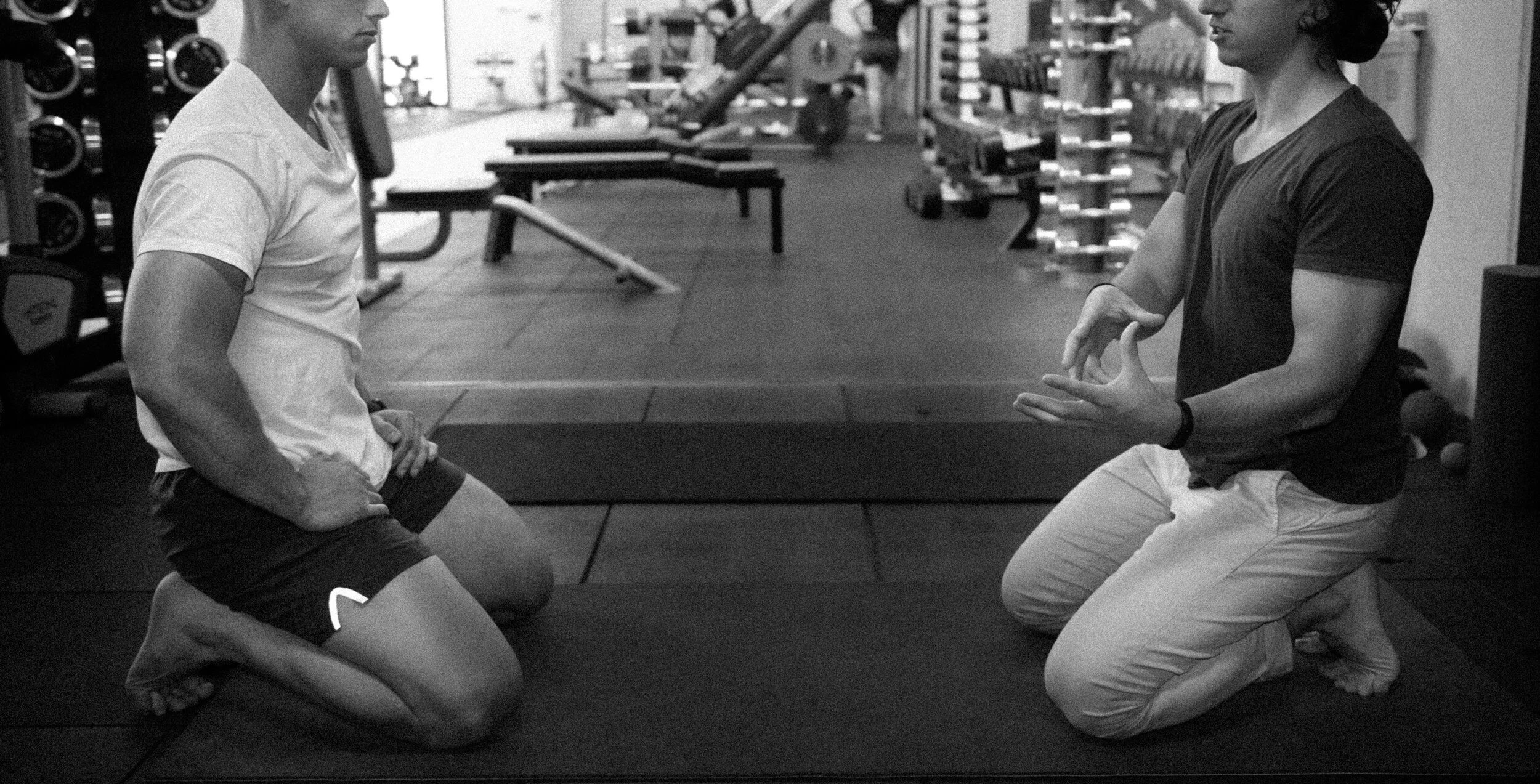 Client receiving integrative physiotherapy assessment at Lionheart to uncover the root cause of pain and imbalance.