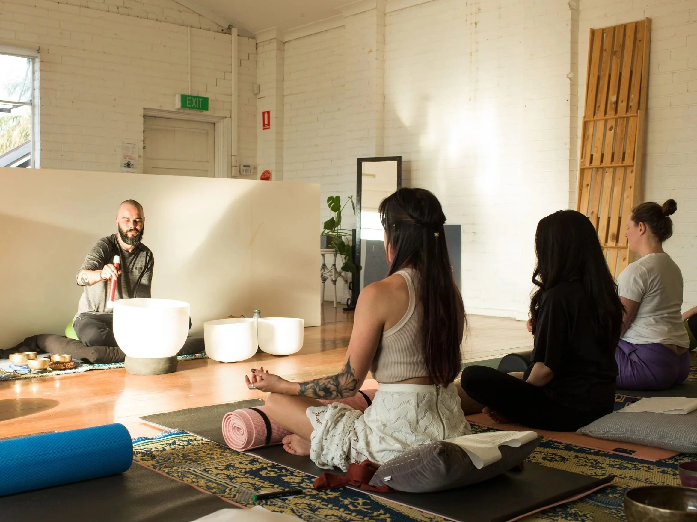 Sound bath session using acoustic instruments to support relaxation and recovery.