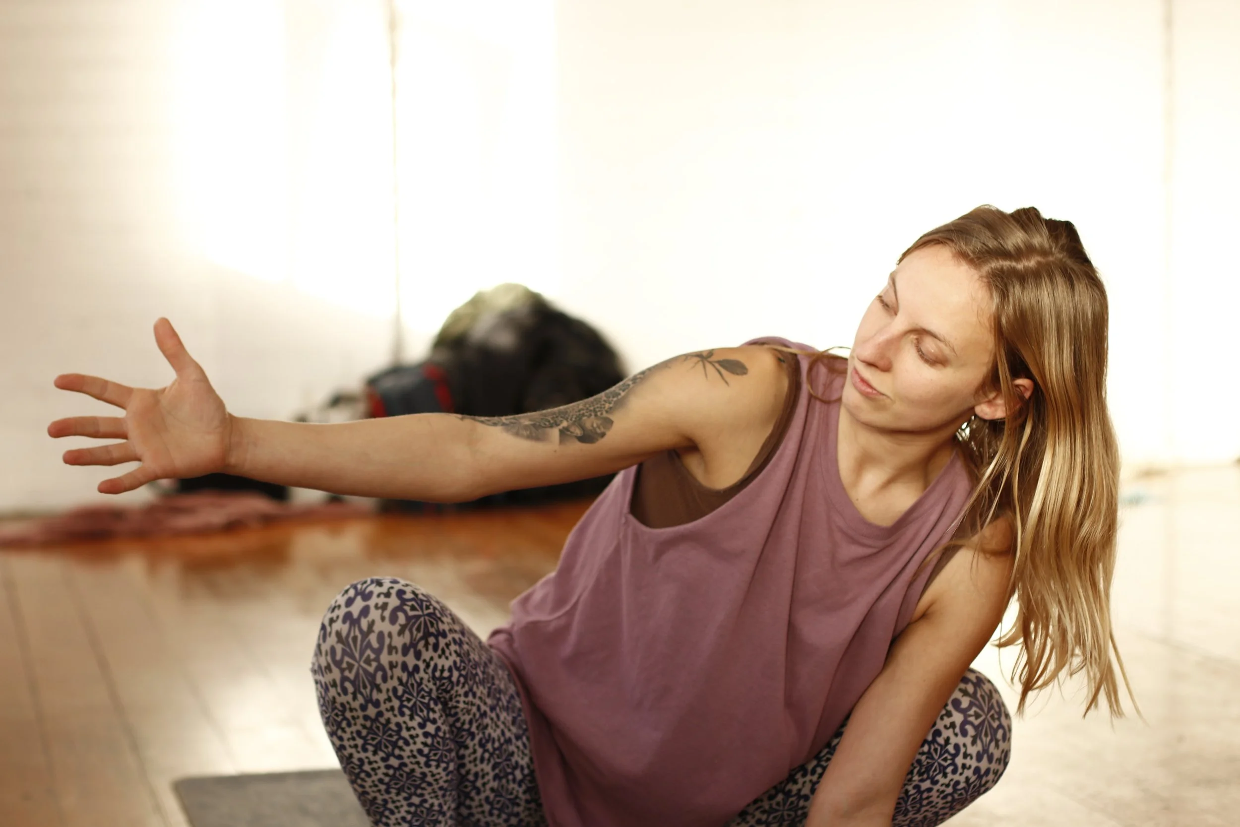 Molly Rose teaching a Primal Movement class at Lionheart Integrative Therapies in Collingwood, focused on functional mobility and dynamic strength.