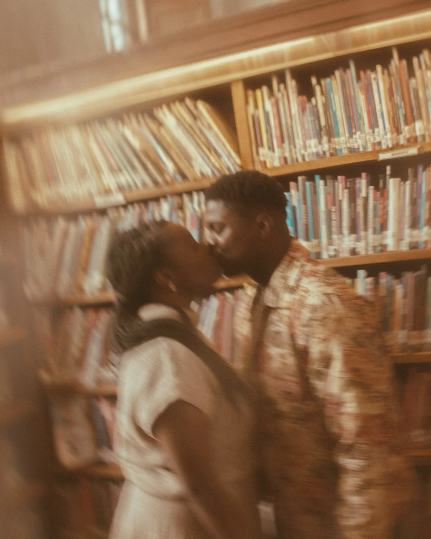 Love between the lines&hellip; 📖📚📙📕❤️

This was my first time capturing love in a library! How did I do!?!? 
I am swooning over these images! 

If you are interested in a couple shoot but &ldquo;not in this weather&rdquo; libraries and museums ar