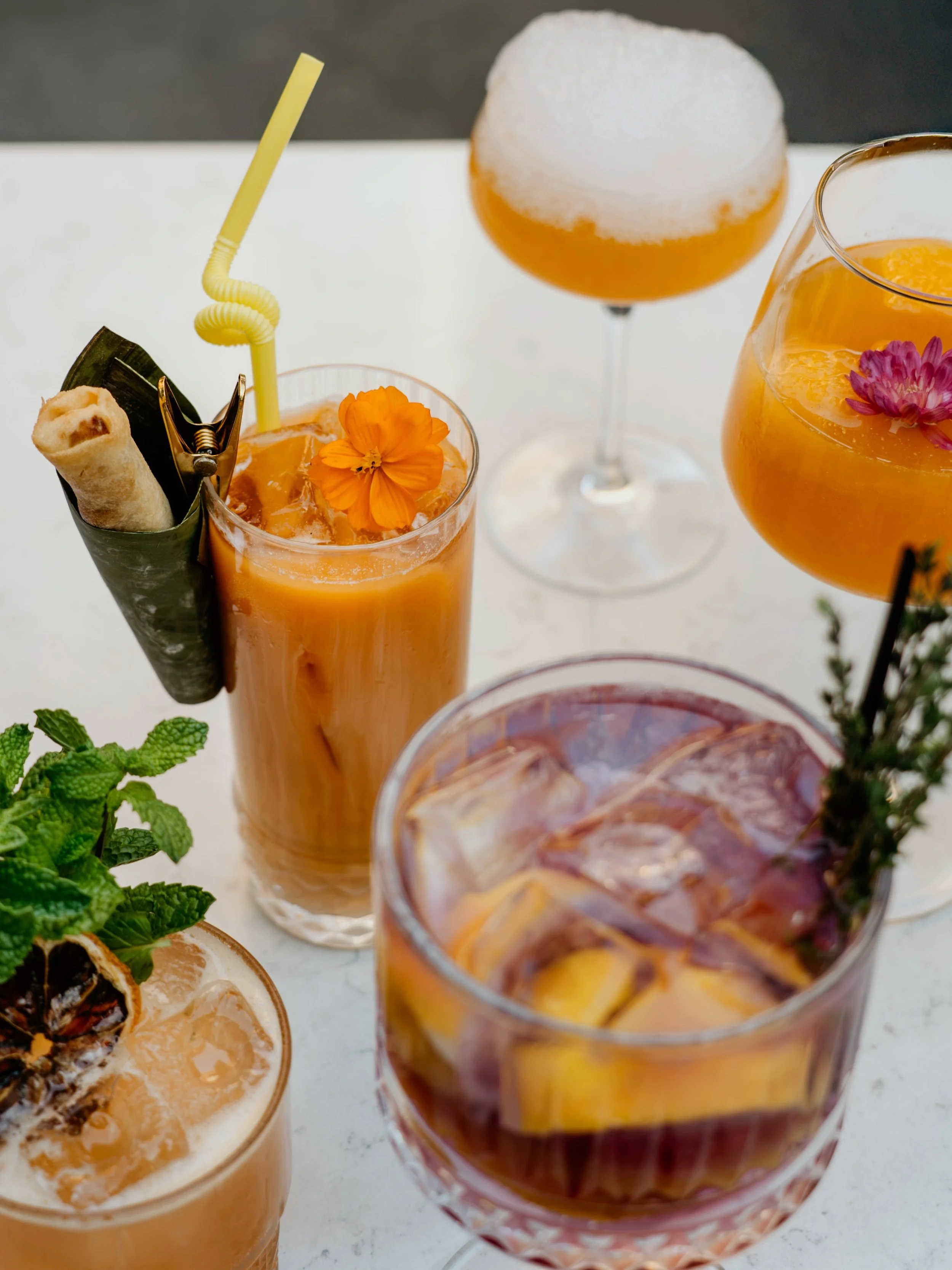 It&rsquo;s officially the season of colorful damn good cocktails 🍹✨

The kind that glow under patio lights, disappear way too fast, and make you immediately text your friends &ldquo;you need to come here.&rdquo;

Bright. Bold. Tropical. A little unh