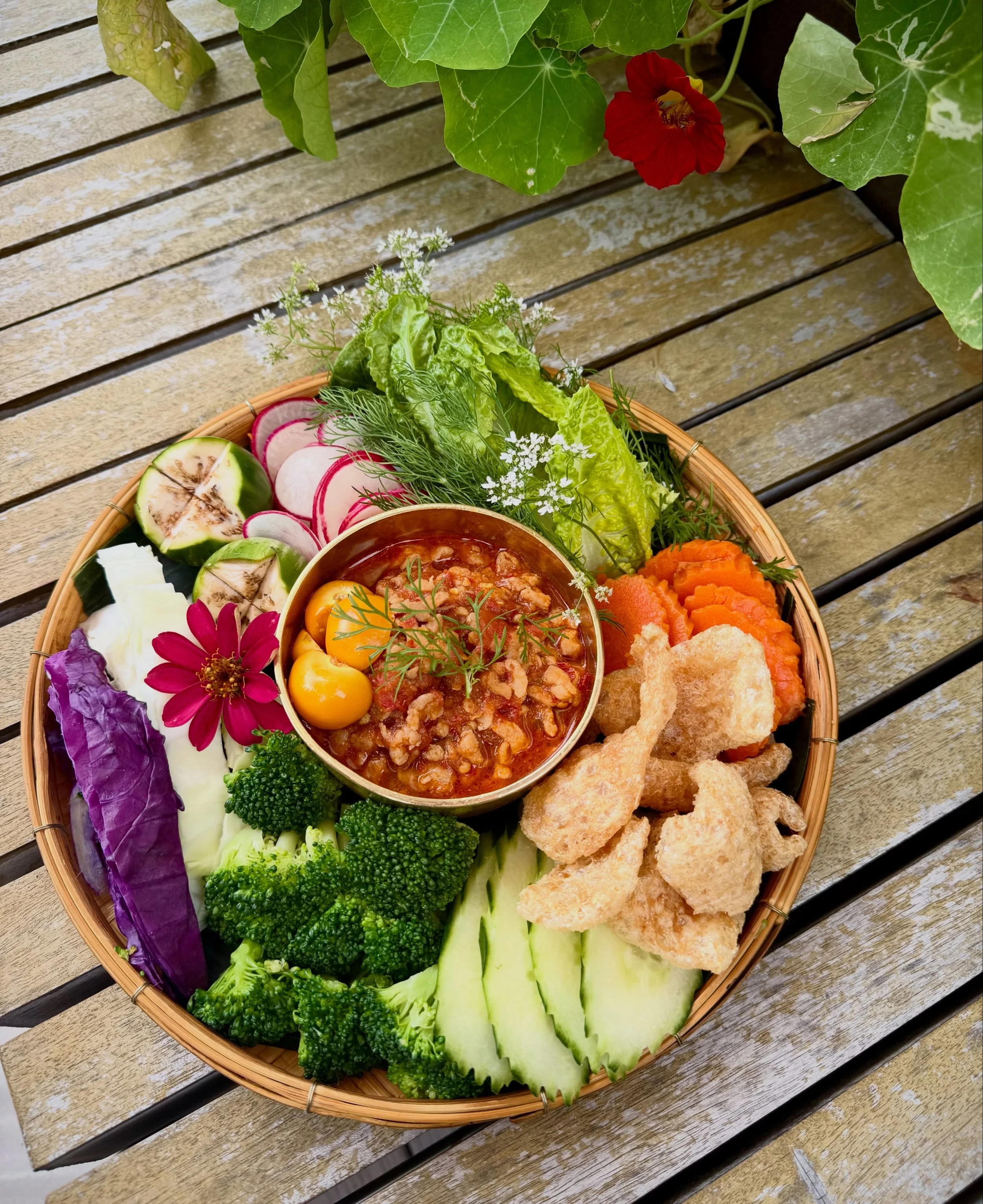 🔥 NEW DISH ALERT! 🔥

Meet Nam Prik Ong (น้ำพริกอ่อง)&mdash;Northern Thailand&rsquo;s version of chili. 🇹🇭🌶️

Rich pork, tomatoes, roasted chilies, garlic, and shallots are slow-simmered into one seriously flavorful dish, served with a colorful s