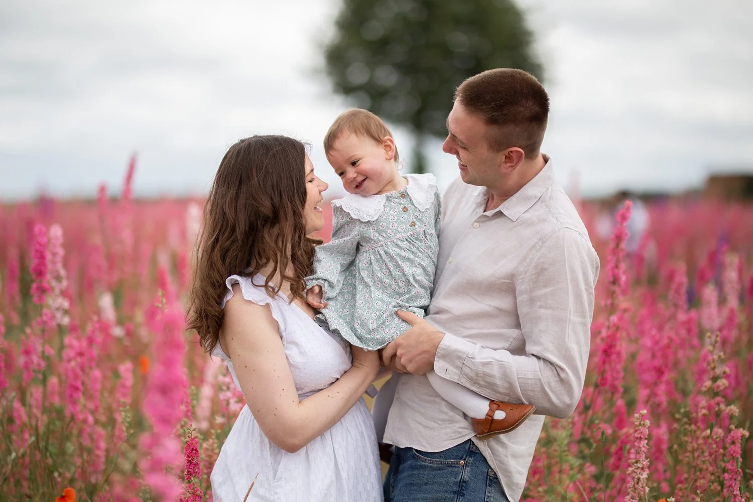 natural family photoshoot in confetti flower field pershore