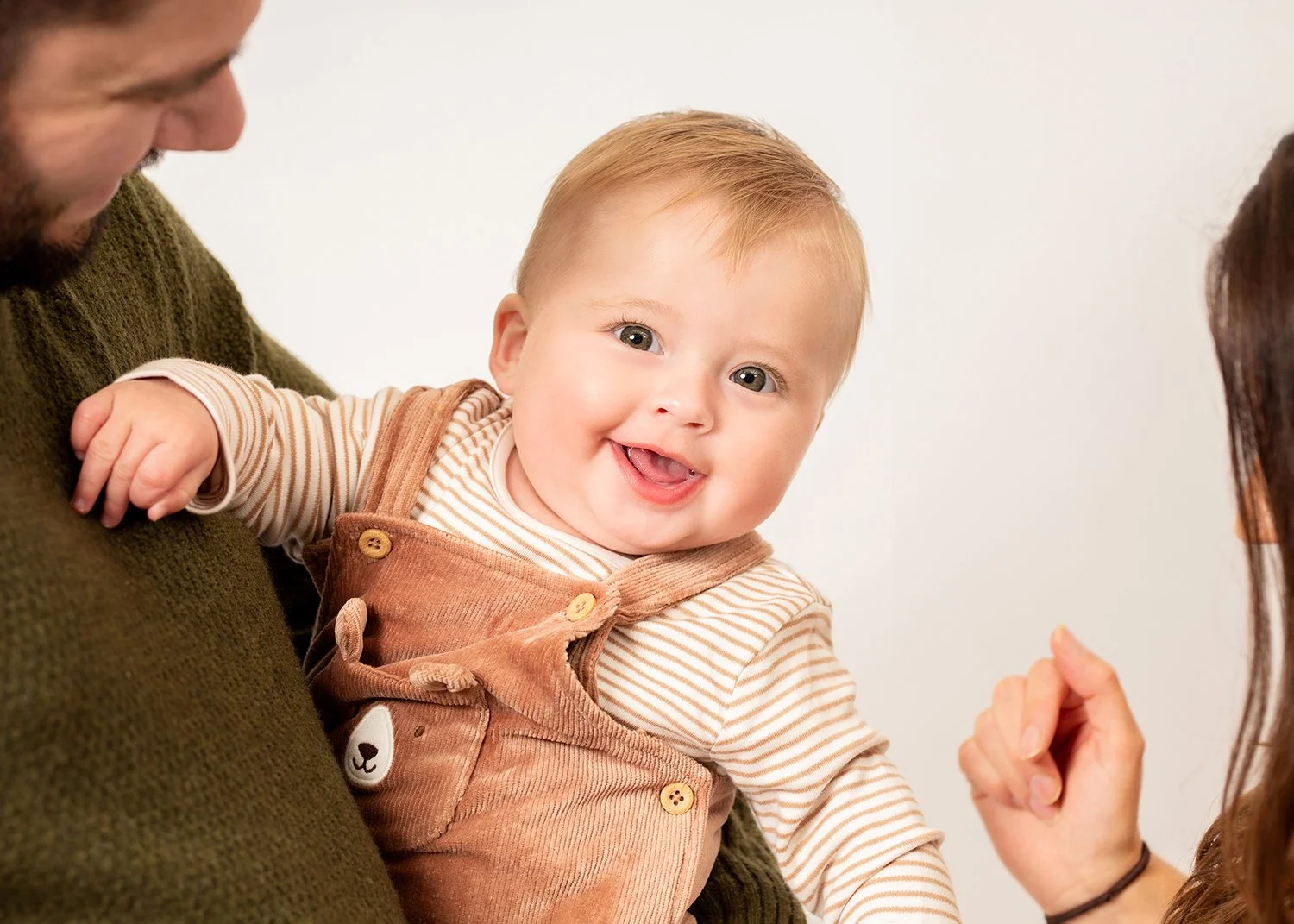 smiling baby boy photo during a family photoshoot in Cheltenham Gloucestershire