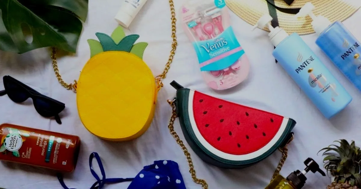 A flatlay consisting of Herbal Essences, Pantene, Venus, Handbags