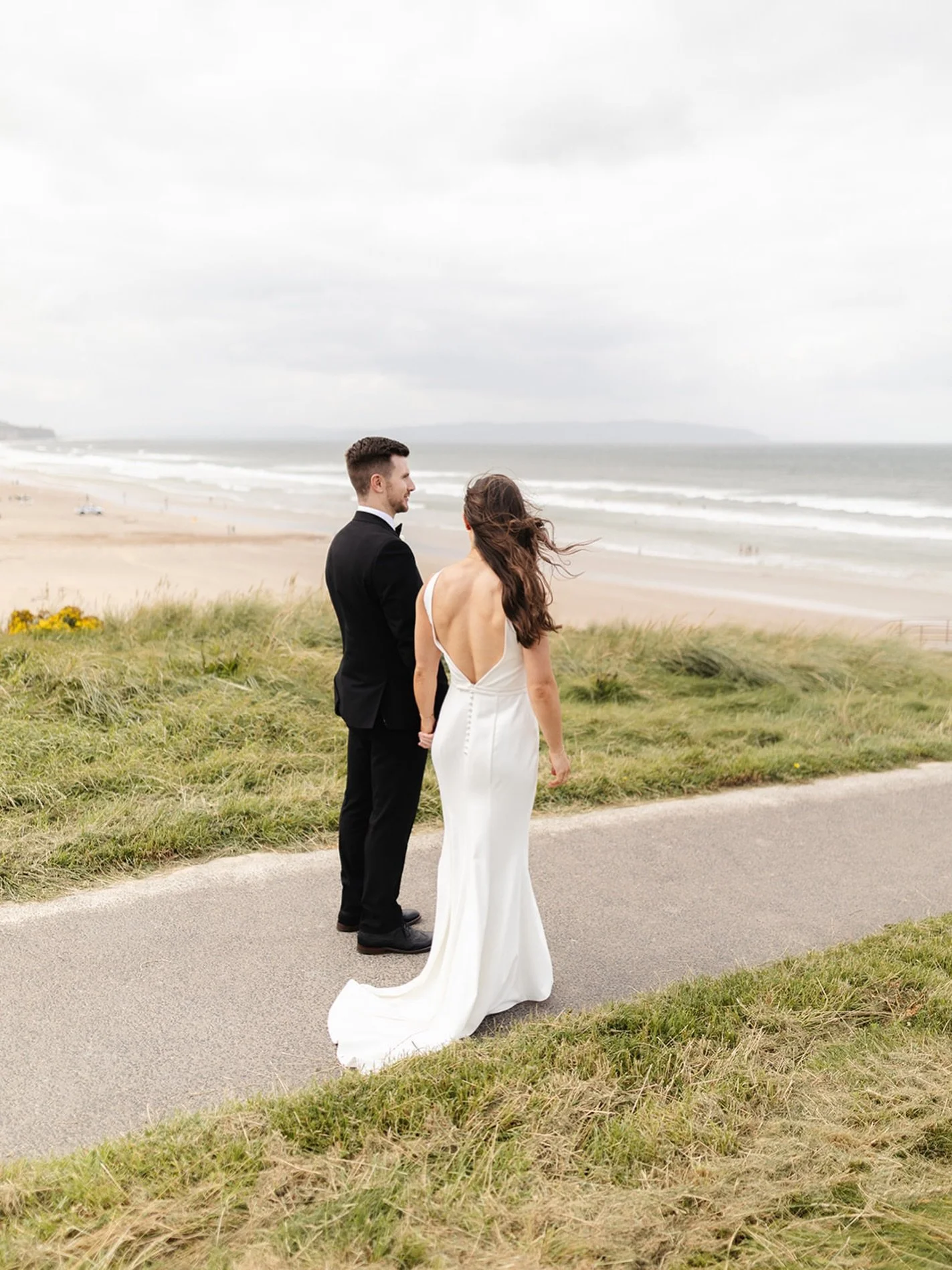 Eil&iacute;s &amp; Hal 🤍 and that iconic view over Portstewart Strand 

Vendors:
Dress shop: @pippabridal 
Florals - @stablesflowerco 
Hair - @francescabradleyhair_ 
Makeup- @rebeccaduff_makeup 
Venue - @ballynessresort 
Cake: - @cakesbygracemoore 
