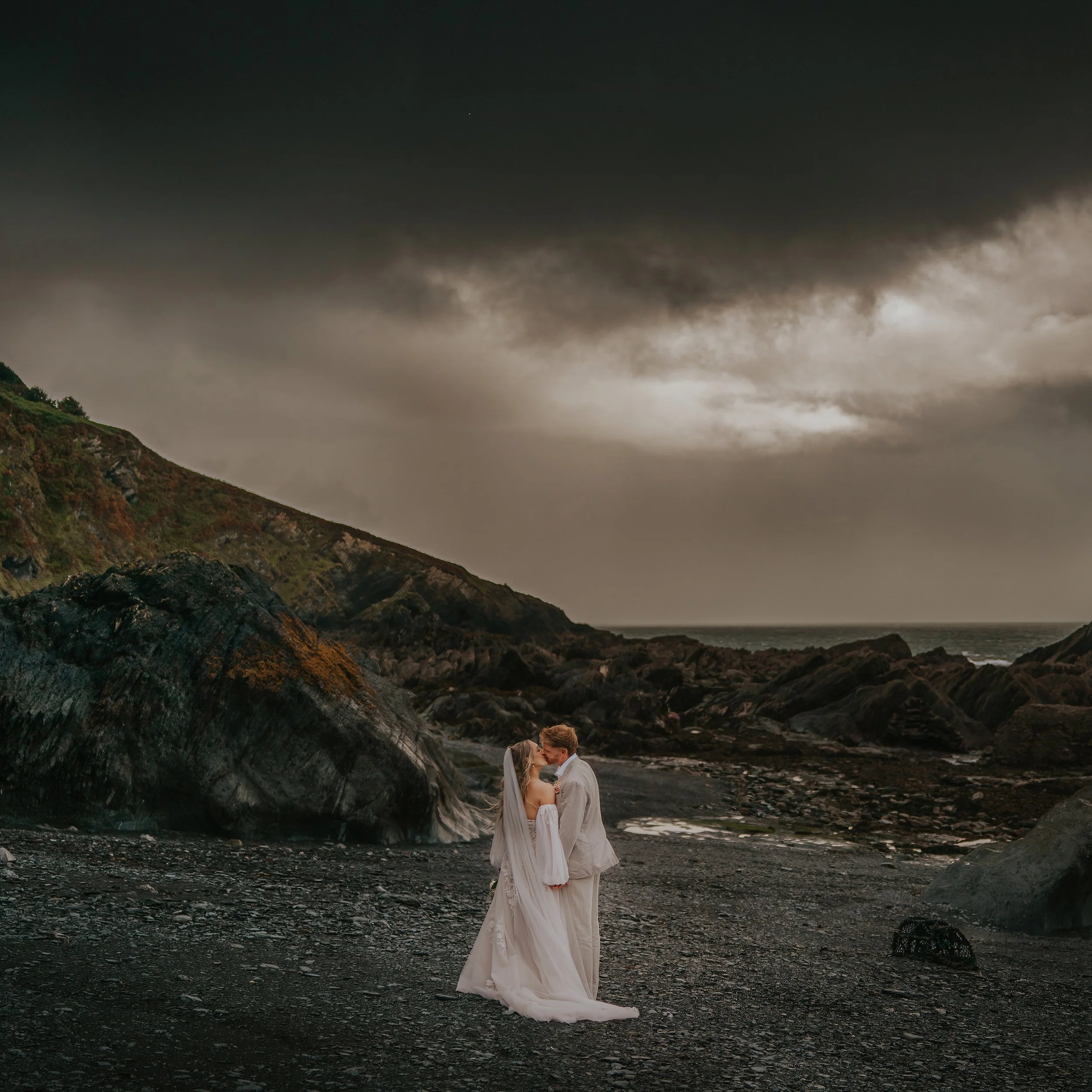 Devon Tunnels Beach Wedding Stormy Sky.jpg