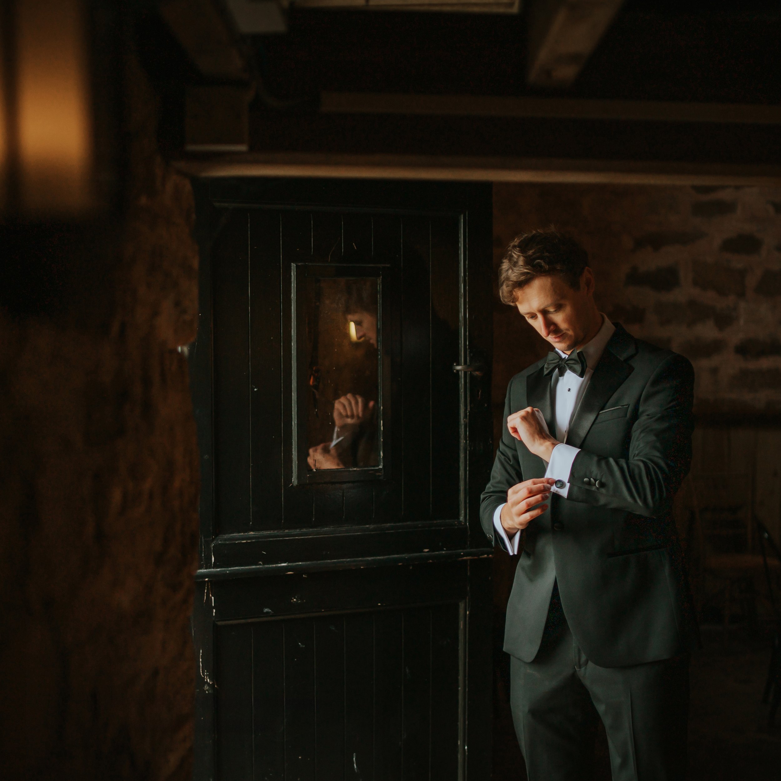 groom-prep-cufflinks-danby-castle-barn-wedding-venue.jpg