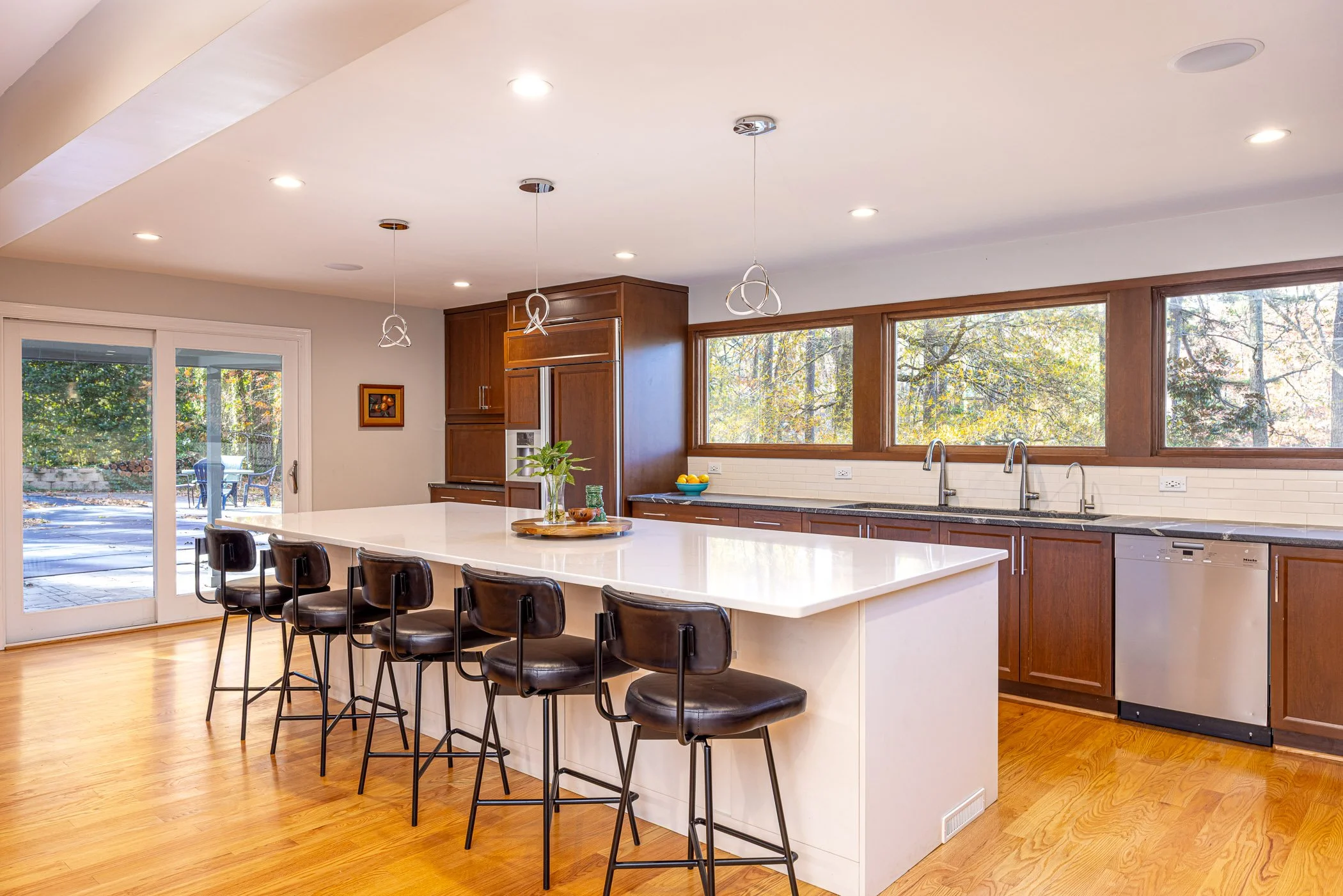 Mid century modern designed kitchen with furniture grade cabinetry installation by Hampton Kitchens.