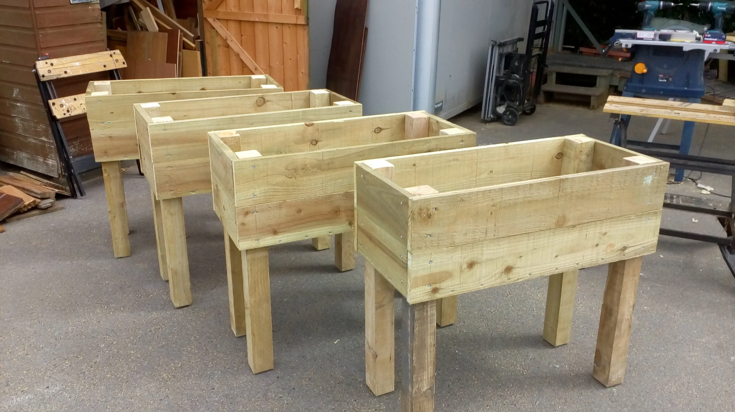 Raised wooden planters