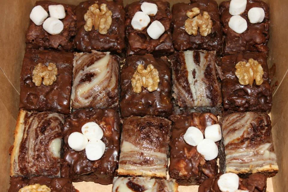 Assorted Flavors: Cheesecake, Rocky Road, & Turtle Brownies
