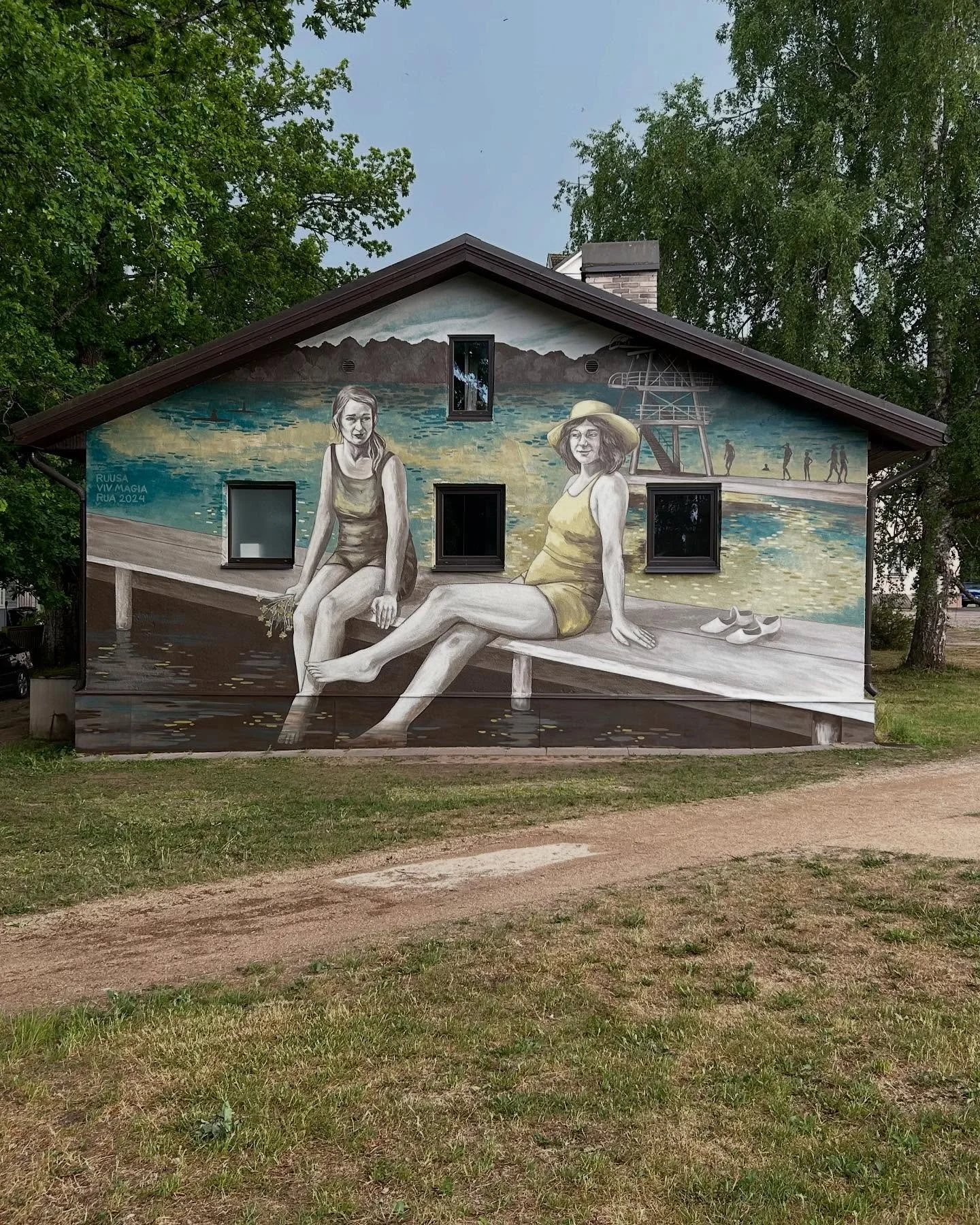 Last summer 2024, I (Ruusa) had the pleasure of being invited to the wonderful RUA Street Art Festival in Elva, Estonia, together with Viv Magia. We collaborated on a mural titled Lake Verevi (Verevi j&auml;rv), inspired by the local history of the E
