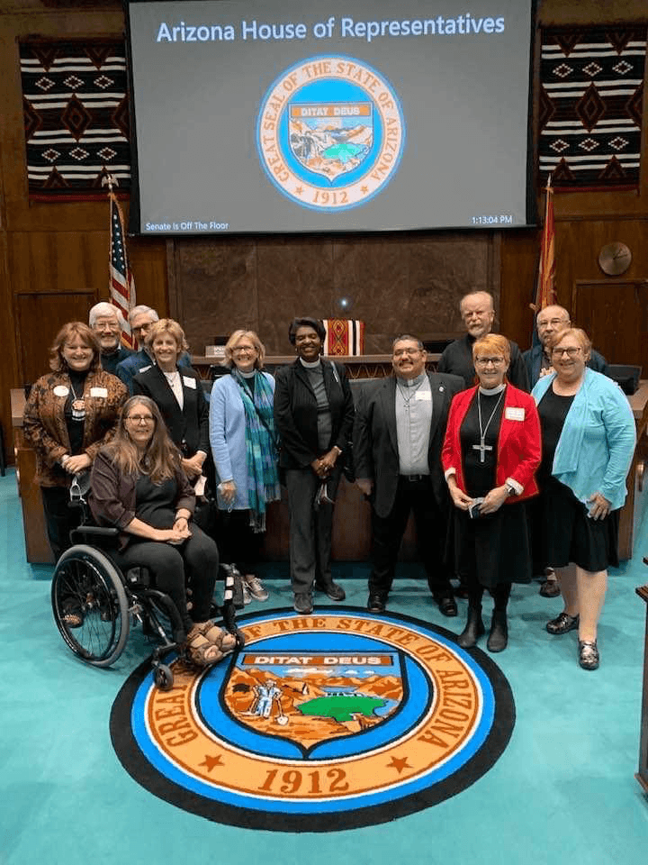  Bp. Hutterer offers Invocation at start of session, Rep. Longdon introduces her. From left to right: Solveig Muus, Keith Hainy, Rep. Jennifer Longdon, Mark Engel, Debra Slack, Intern Pastor Jen Smith, Rev. Jacqui Pagel, Rev. Miguel Gomez-Acosta, Rev