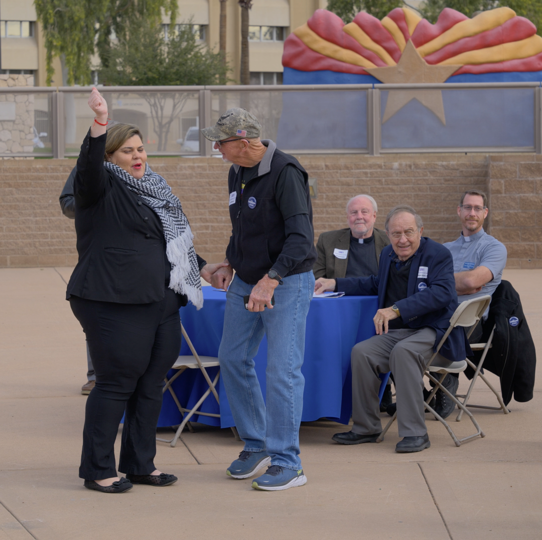  Sen. Raquel Terán (D), LD26, cheers for her colleague, Rep. Tim Dunn (R) LD25 as he takes the podium. Also pictured left to right: Vic Peterson (Christ Evangelical, Goodyear), Pr. Conrad Braaten and Wayne Brezina (Christ, Sedona) and Pr. Brian Weinb